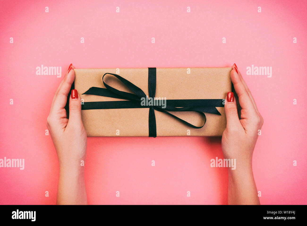 Woman Hands Give Wrapped Valentine Or Other Holiday Handmade
