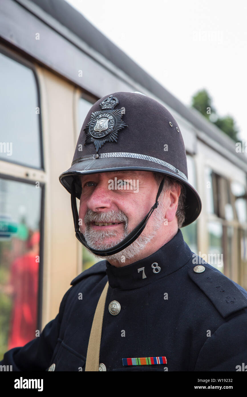 Kidderminster, UK. 29th June, 2019. Severn Valley Railways 'Step back to the 1940's' gets off to a fabulous start this summer weekend with re-enactors playing their part in providing an authentic recreation of second world war Britain. A vintage policeman, on duty in full police uniform, ensures a British Bobby is always present. Credit: Lee Hudson Stock Photo
