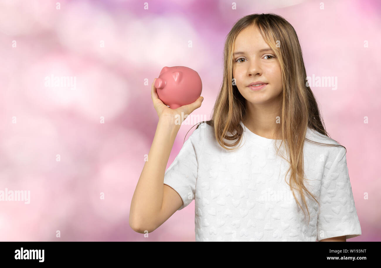 girl with piggy bank Stock Photo - Alamy