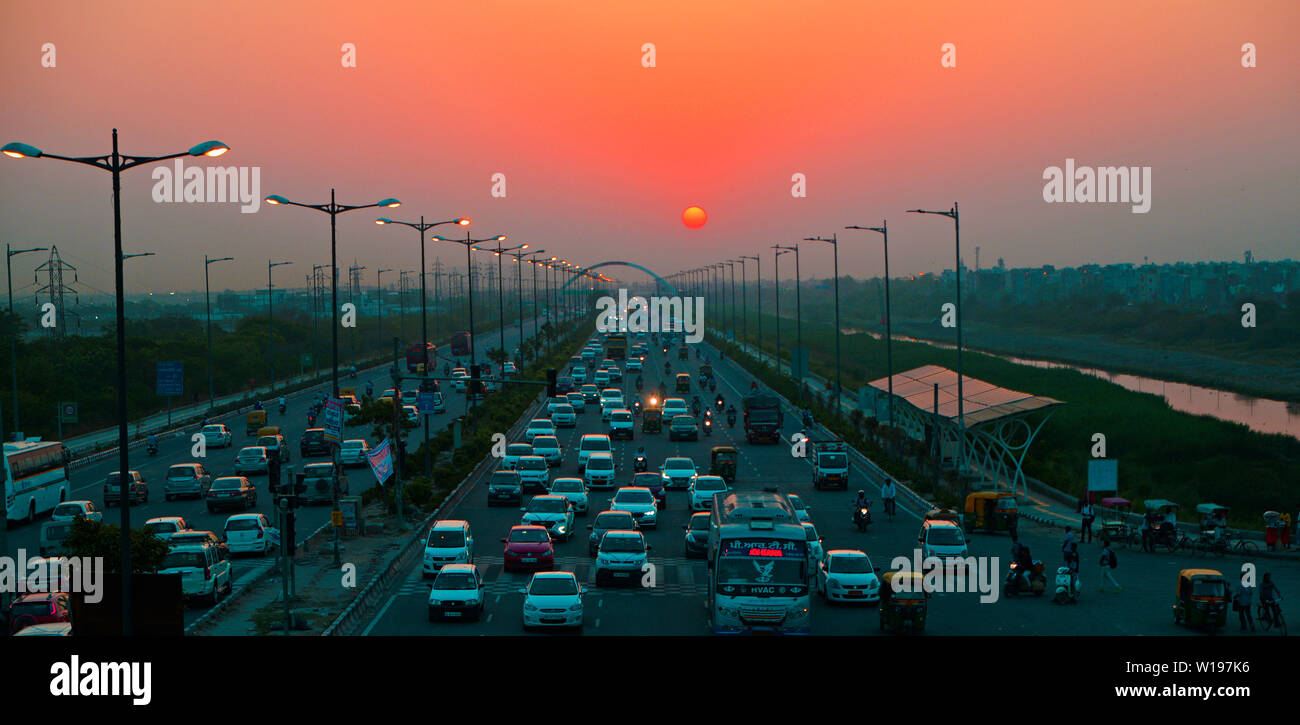 sunset with traffic on Highway at New Delhi,India Stock Photo Alamy