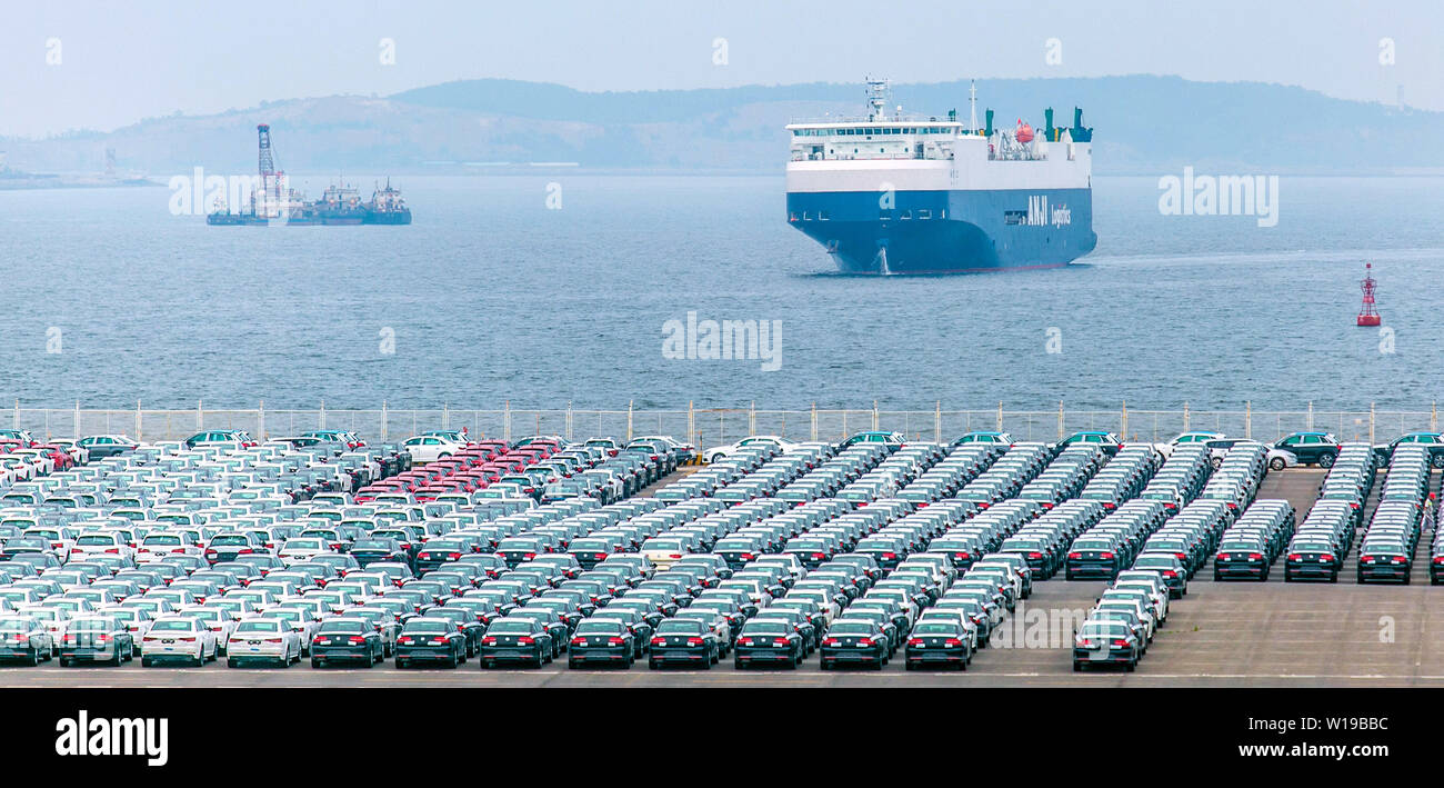 (190701) -- DALIAN, July 1, 2019 (Xinhua) -- Photo taken on June 28, 2019 shows the vehicle terminal of Dalian Port in Dalian, northeast China's Liaoning Province. The 2019 Summer Davos Forum is held from July 1-3 in northeast China's coastal city of Dalian. Established by the World Economic Forum in 2007, the forum is held annually in China, alternating between the two port cities of Dalian and Tianjin. Summer Davos has been reshaping the landscape of Dalian's regional economy and strengthening the port's trade with other markets. Dalian has become an international city and a showpiece of Chi Stock Photo