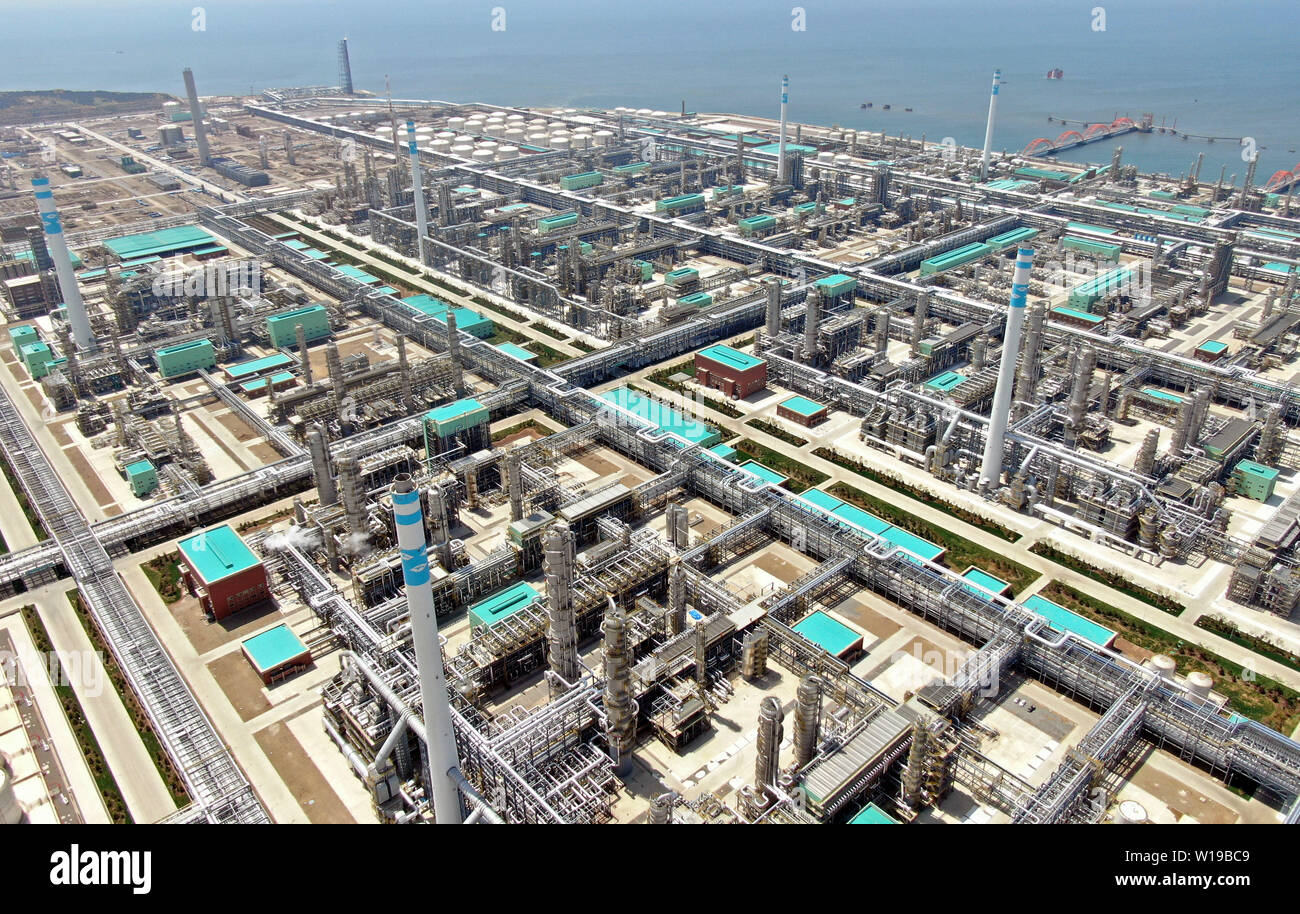 (190701) -- DALIAN, July 1, 2019 (Xinhua) -- Aerial photo taken on May 17, 2019 shows the Hengli Petrochemical (Changxing Island) Industrial Park in Dalian, northeast China's Liaoning Province. The 2019 Summer Davos Forum is held from July 1-3 in northeast China's coastal city of Dalian. Established by the World Economic Forum in 2007, the forum is held annually in China, alternating between the two port cities of Dalian and Tianjin. Summer Davos has been reshaping the landscape of Dalian's regional economy and strengthening the port's trade with other markets. Dalian has become an internation Stock Photo