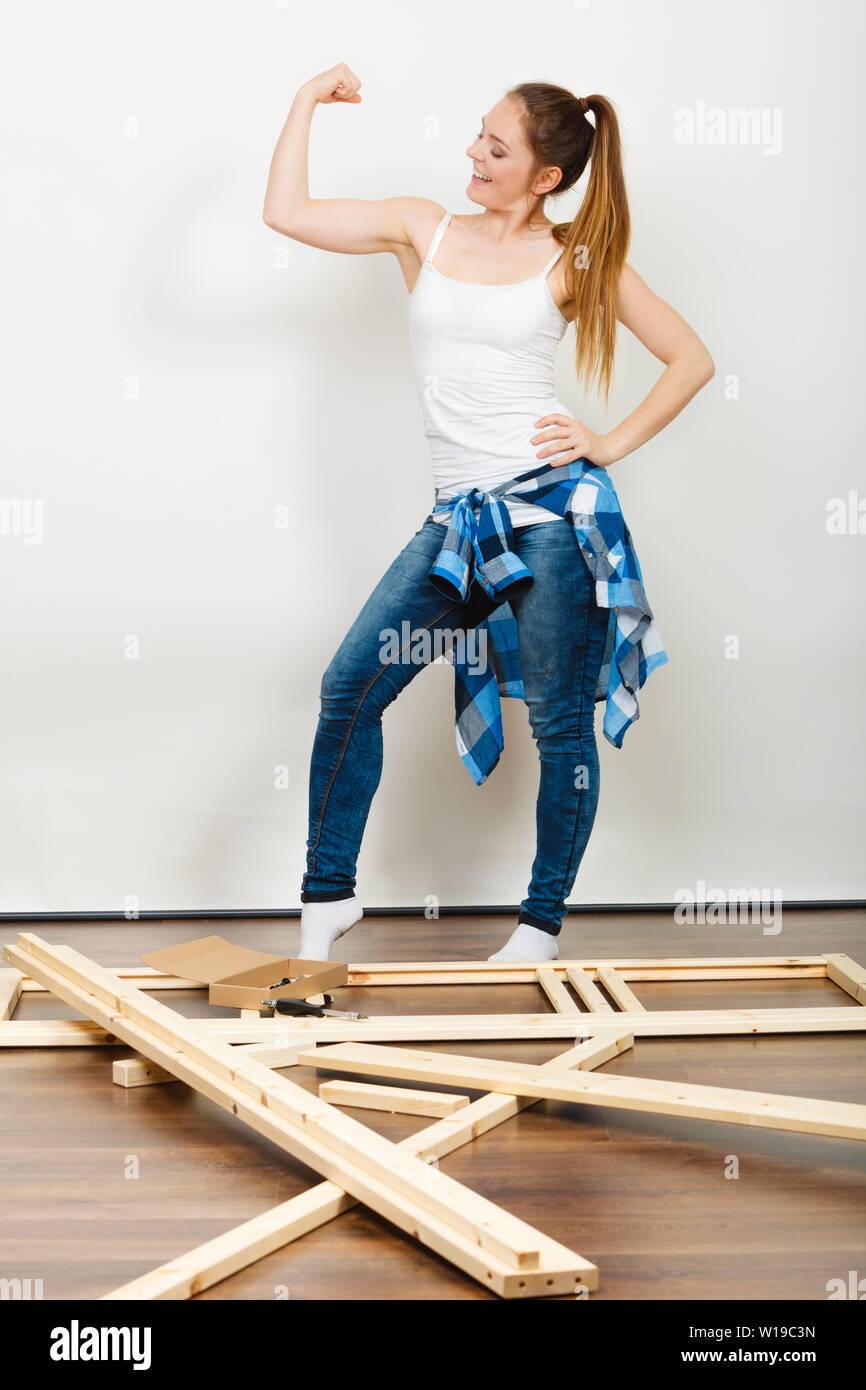 Successful and strong woman moving into new apartment house with