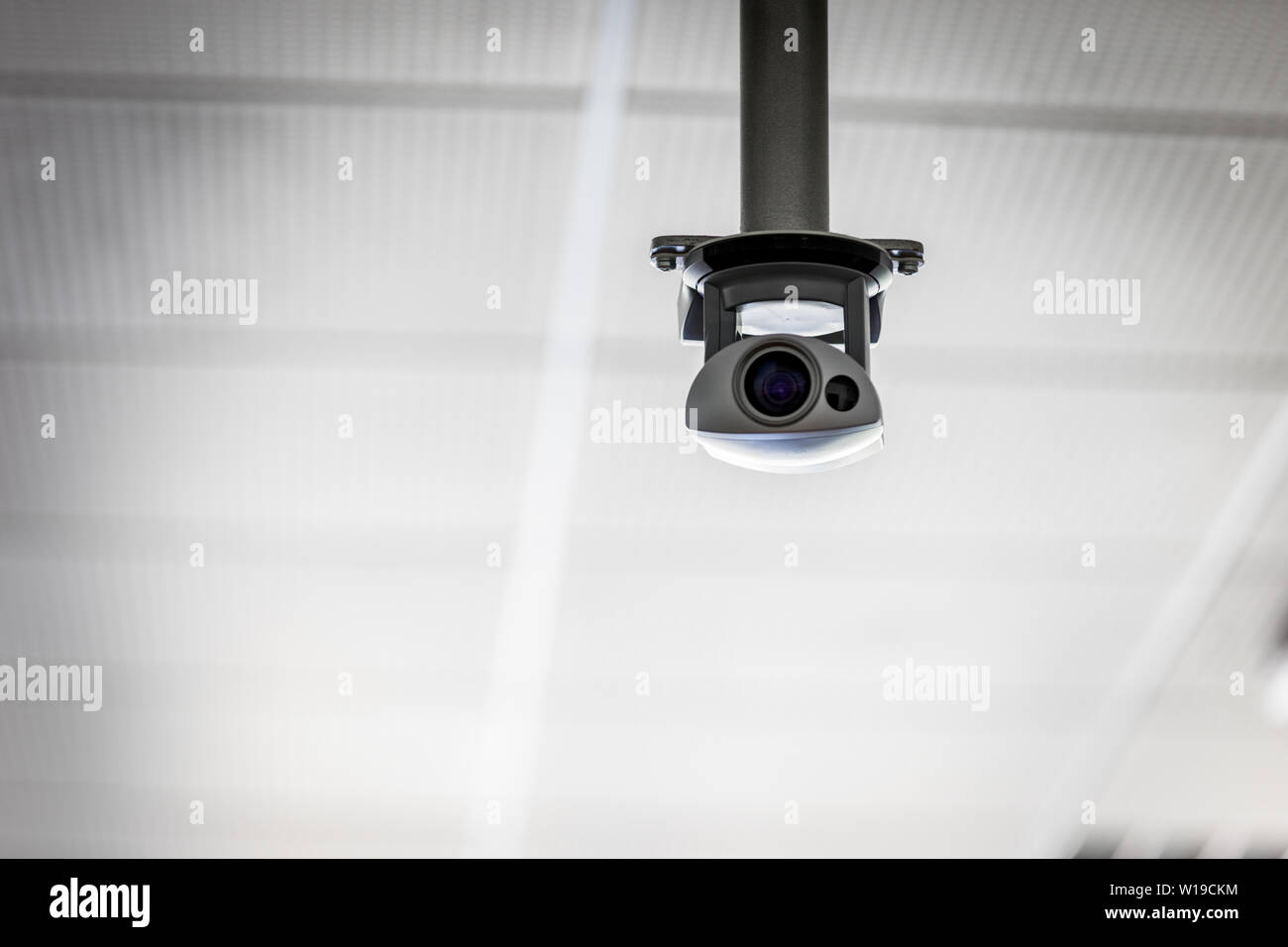 Overhead Surveillance Camera Suspended From The Ceiling Hanging On