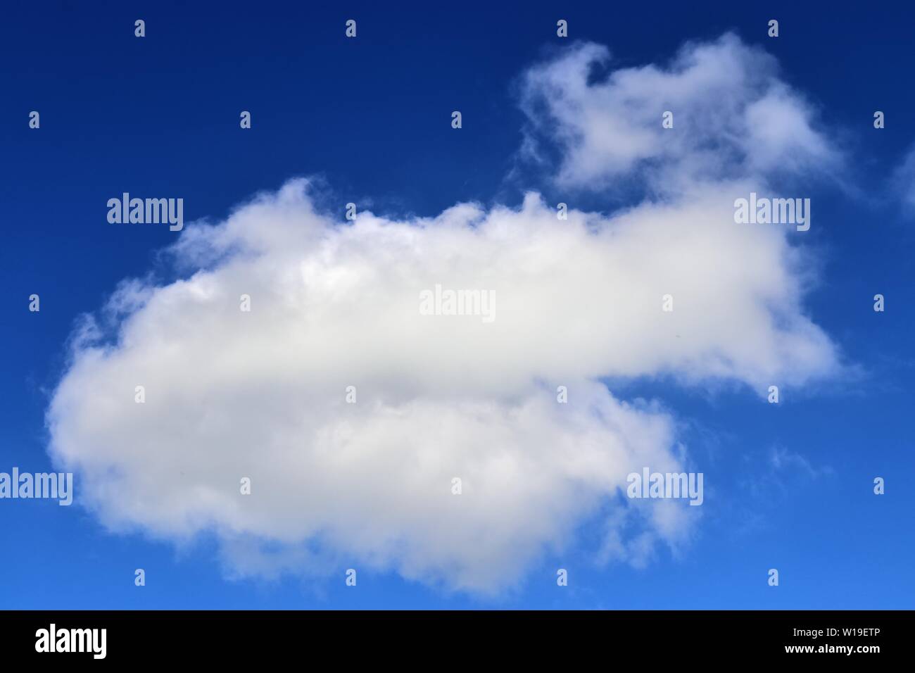 Beautiful fluffy white clouds in a deep blue sky on a summer day Stock ...