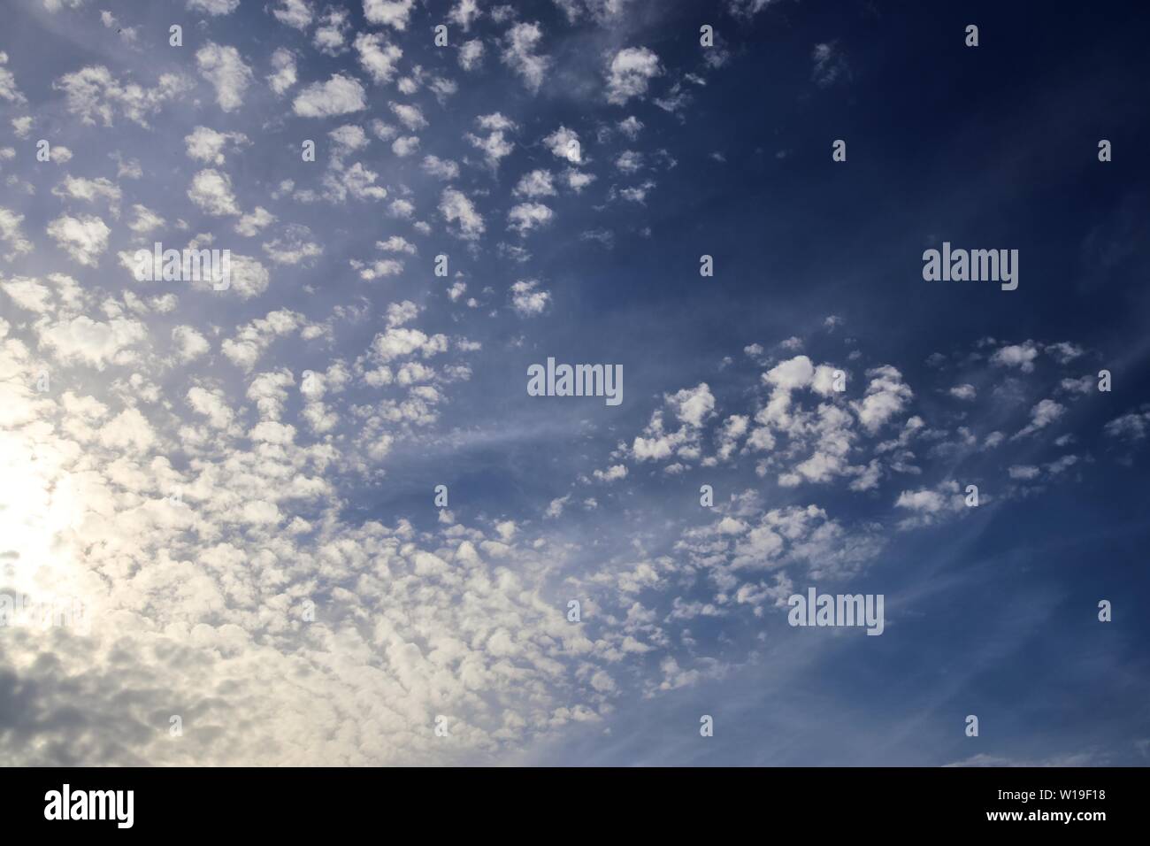 Beautiful fluffy white clouds in a deep blue sky on a summer day Stock ...