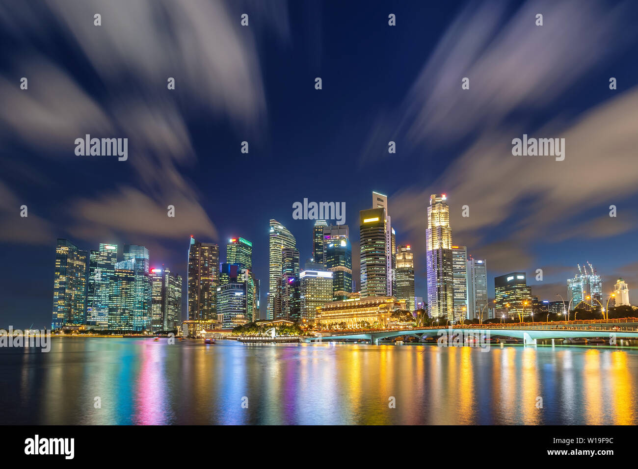 Singapore night city skyline at Marina Bay and Singapore business district Stock Photo