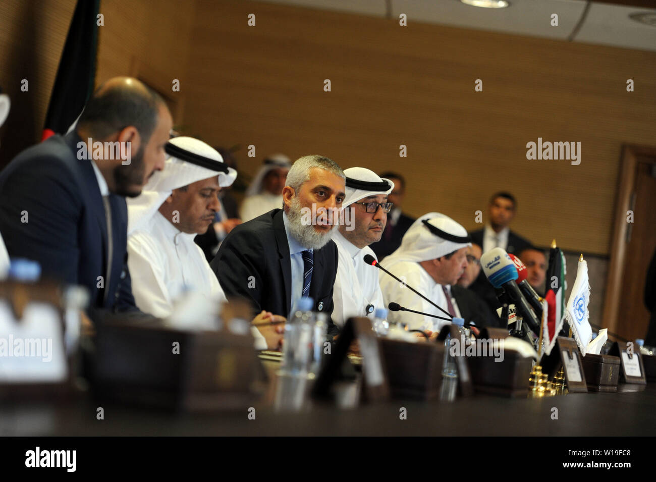 Al Ahmadi Governorate. 1st July, 2019. Kuwait Oil Company (KOC) CEO Emad Al-Sultan (3rd L) speaks at a press conference in Al Ahmadi Governorate, Kuwait, July 1, 2019. KOC on Monday signed a contract worth 181 million Kuwaiti dinars (597 million U.S. dollars) for offshore drilling with U.S. oil field service company Halliburton. Credit: Xinhua/Alamy Live News Stock Photo