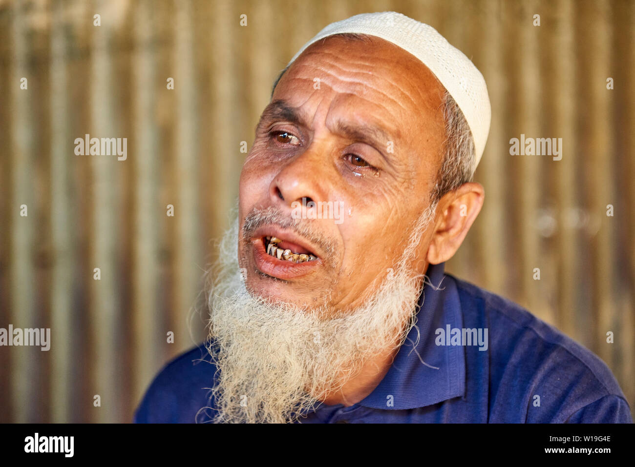 Portrait of Rohingya man in Kutupalong Rohingya Refugee Camp, Bangladesh Stock Photo