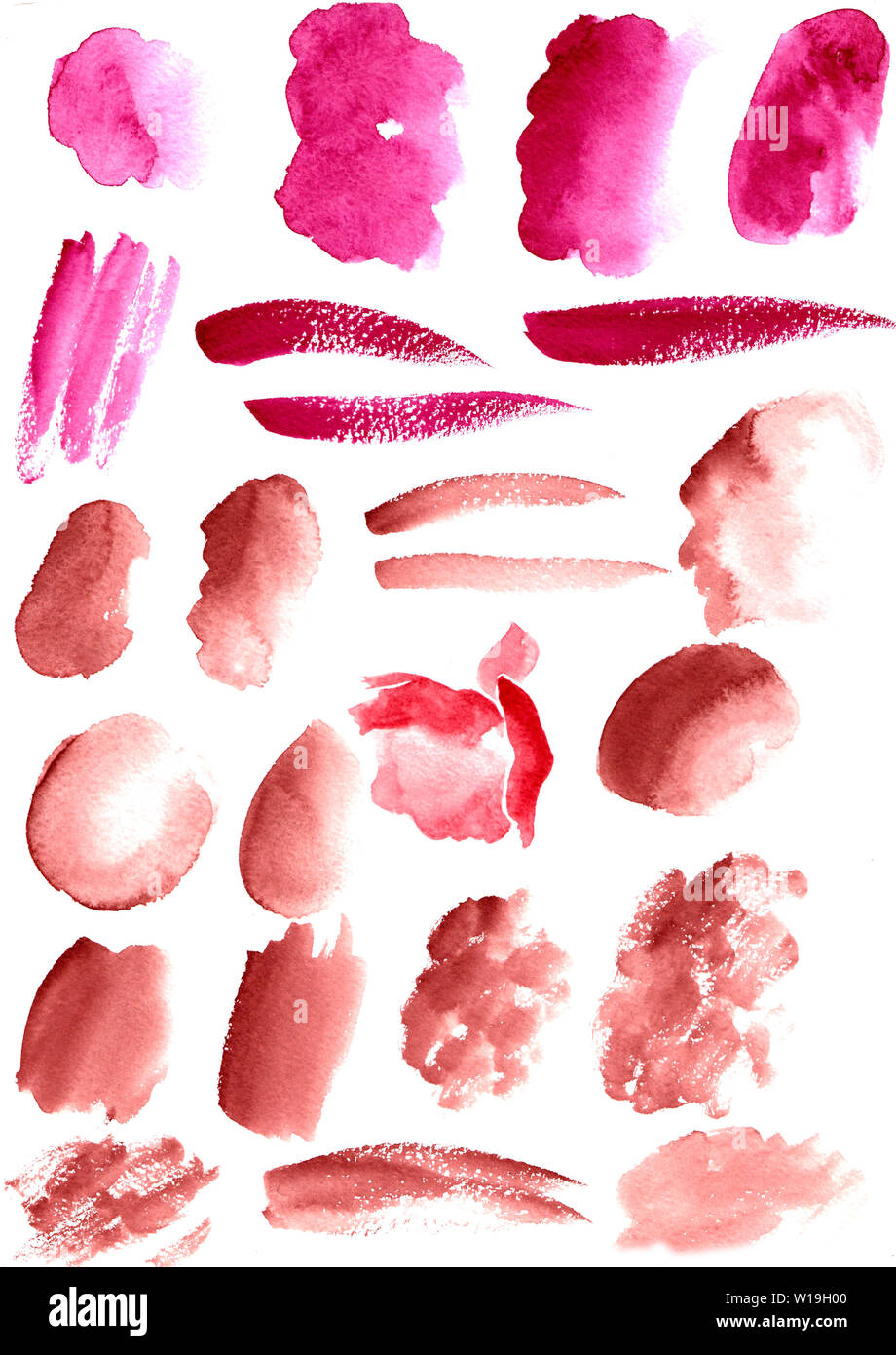 A set of watercolor brush strokes of pink and brown color on texture paper. Stock Photo