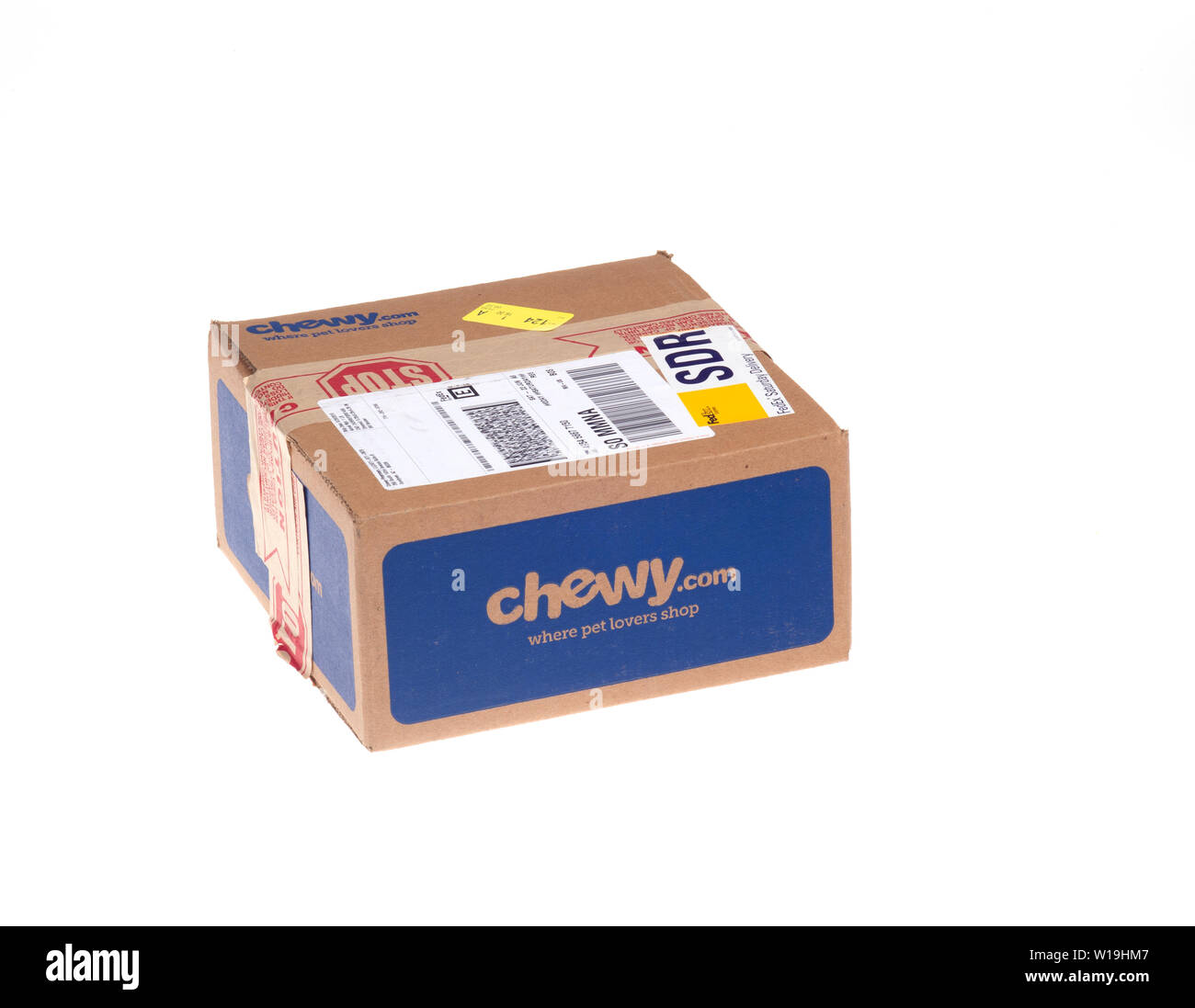 Chewy pet supplies box delivered via FedEx Home delivery on white background Stock Photo