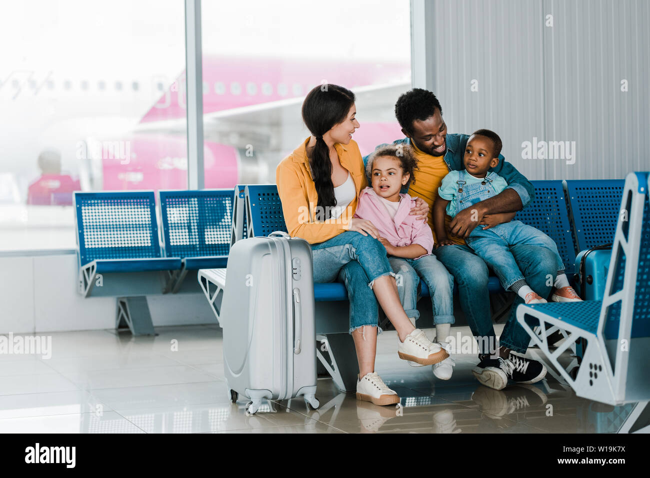 Black african american family airport hi-res stock photography and ...