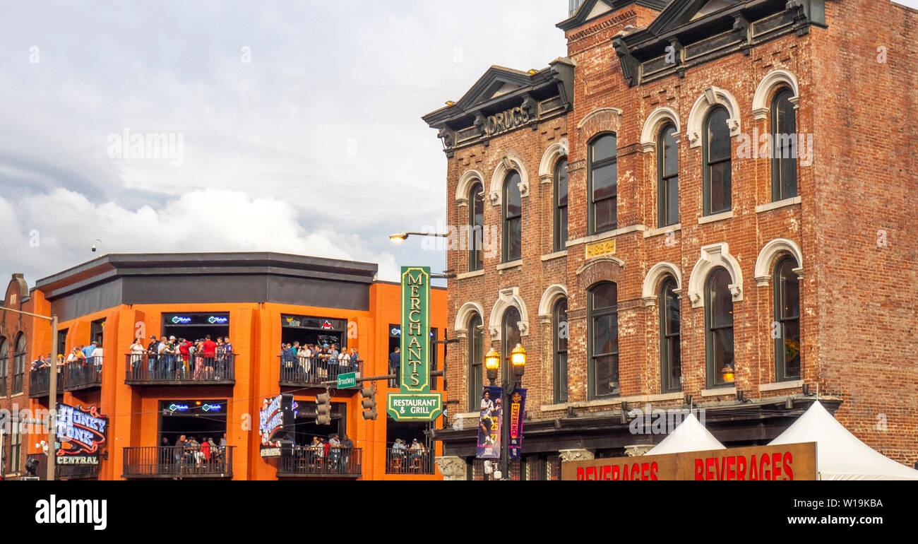 Merchants and Honky Tonk Central bars on Broadway during NFL Draft 2019, Nashville Tennessee, USA. Stock Photo