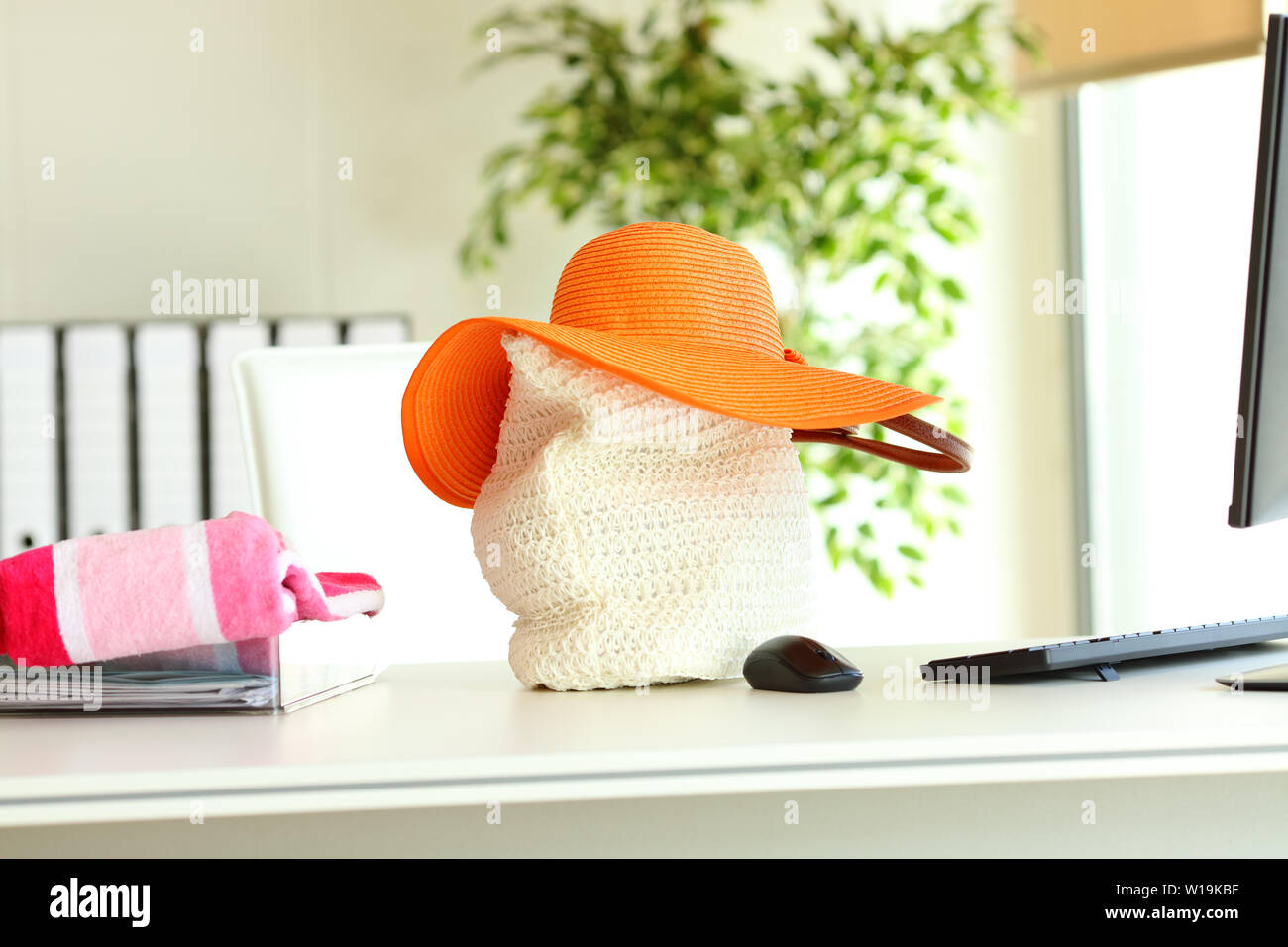 Several beach accessories at office. Vacation concept Stock Photo