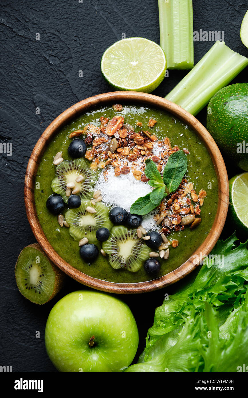Smoothie bowls. Healthy breakfast bowl with chia seeds, muesli, berries, fruits and coconut