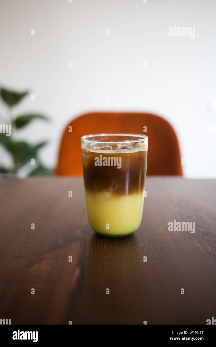 Cold coffee tropic on the wooden table. Stock Photo