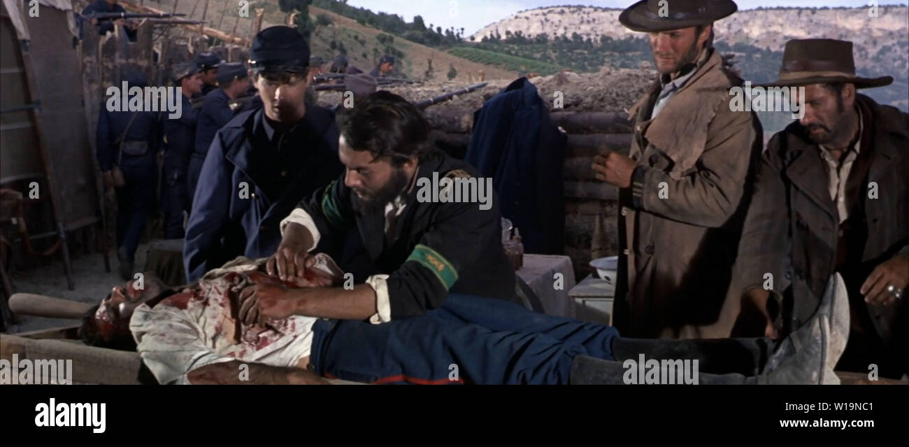 Rome. Italy.Aldo Giuffre (on the table), Eli Wallach and Clint Eastwood in a scene in ©United Artist Films, The Good, The Bad and The Ugly (1966) Director: Sergio Leone Screenplay: Agenore Incrocci, Furio Scarpelli, Luciano Vincenzoni Source: Part of the 'Dollar' film trilogy Ref:LMK110-S240619-001 Supplied by LMKMEDIA. Editorial Only. Landmark Media is not the copyright owner of these Film or TV stills but provides a service only for recognised Media outlets. pictures@lmkmedia.com Prod DB © PEA / DR LE BON, LA BRUTE ET LE TRUAND (IL BUONO, IL BRUTTO, IL CATTIVO) de Sergio Leone 1966 Stock Photo