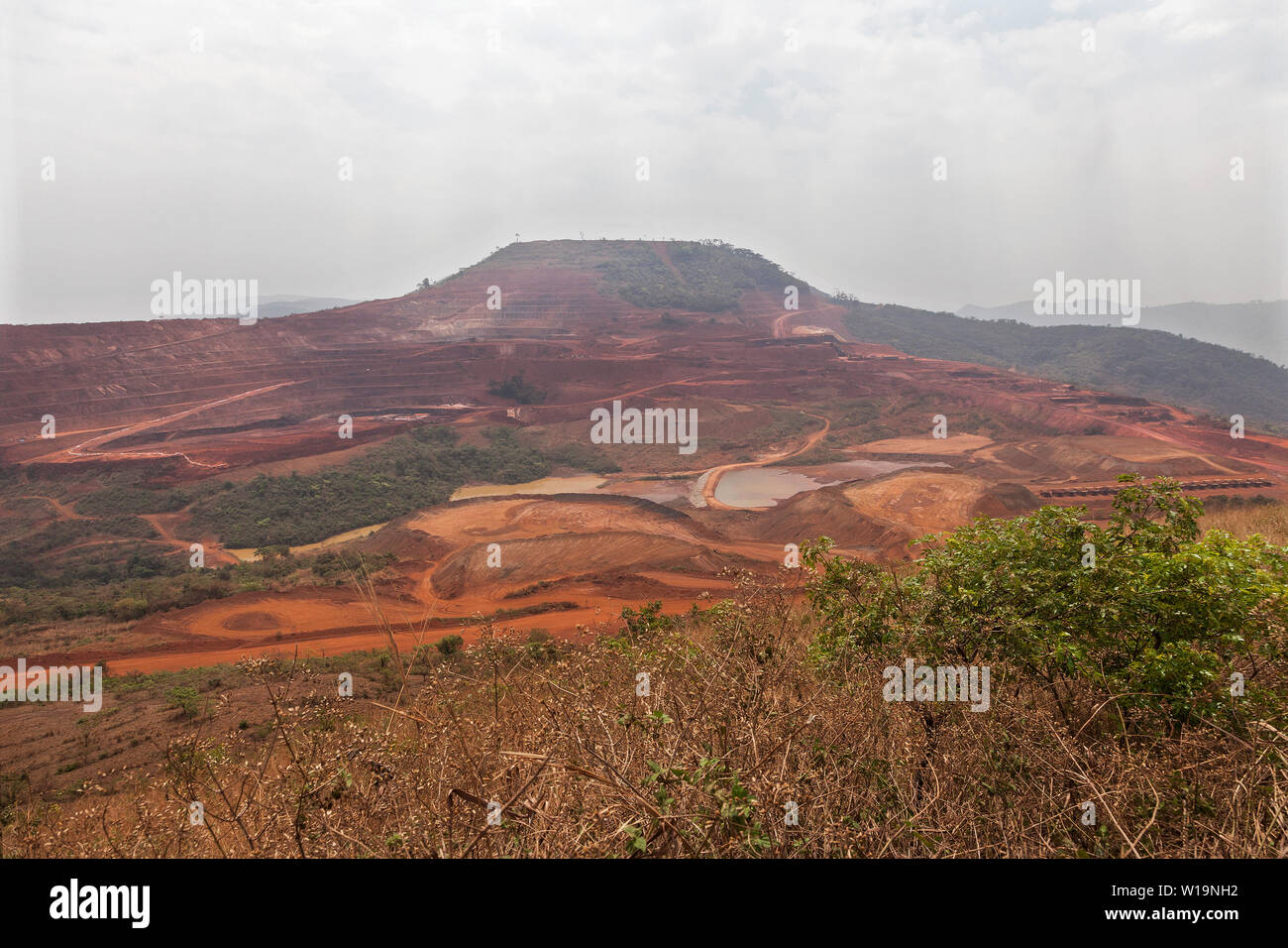 Mining operations for transporting & managing iron ore. Overall view of mine area during initial