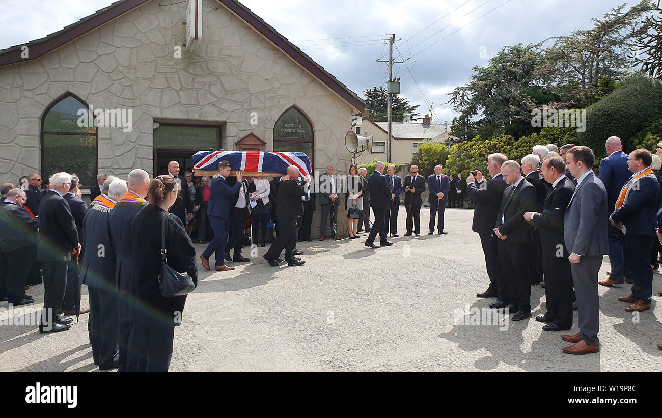 Crowds gathered at the Five Mile Hill Pentecostal Church in Bessbrook, Co Armagh, for the funeral of prominent victims campaigner William Frazer. Stock Photo