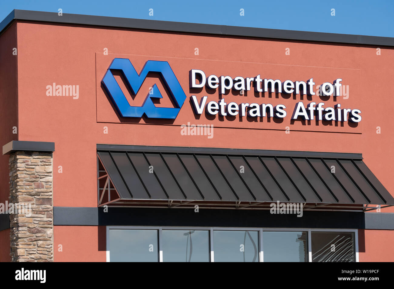GRAND FORKS, ND/USA - JUNE 28, 2019: United States Department of Veterans Affairs outpatient clinic exterior and trademark VA logo. Stock Photo