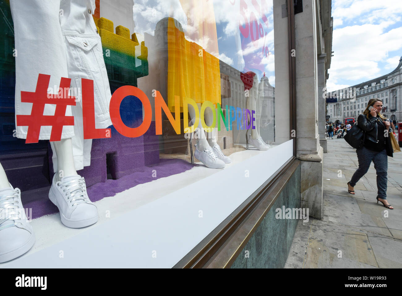 London, UK. 1 July 2019. The Calvin Klein store in Regent Street is one of  many stores in the capital's West End whose exteriors are decorated in  rainbow colours in support of