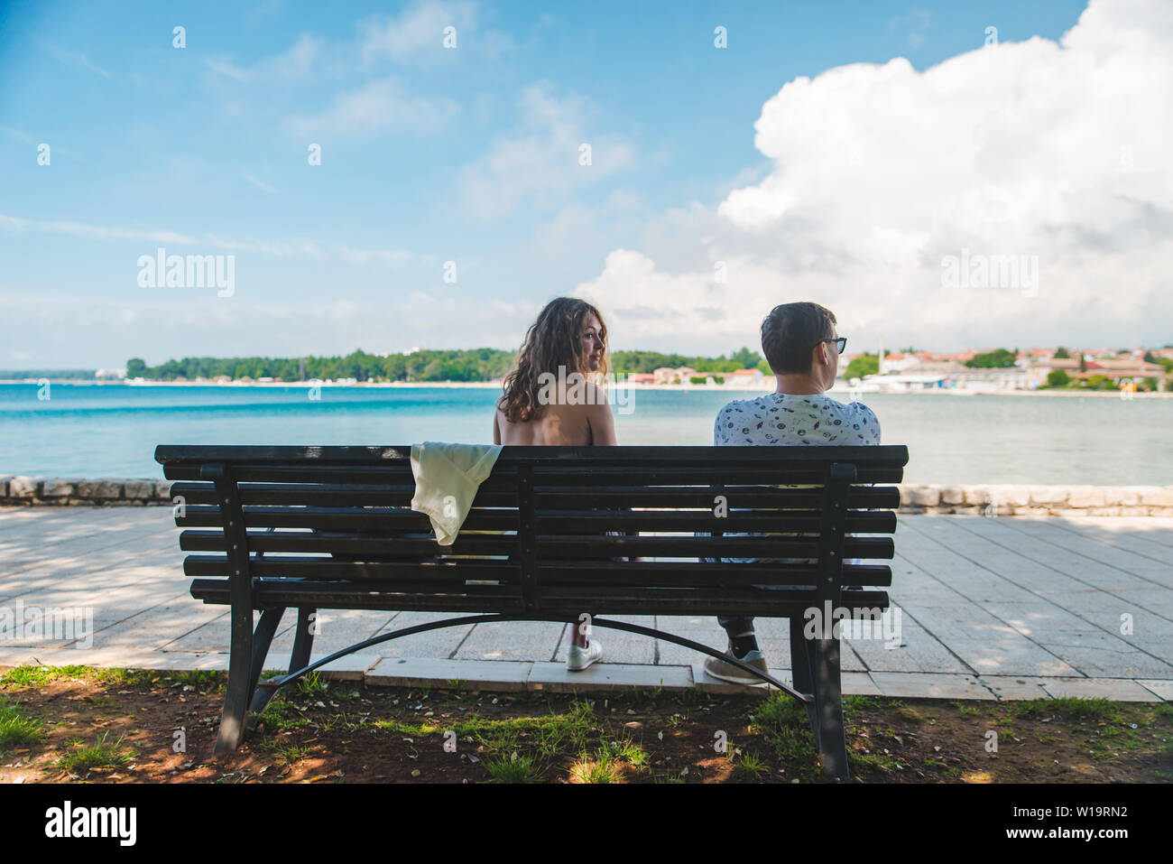Travelers sitting on bench hi-res stock photography and images - Alamy