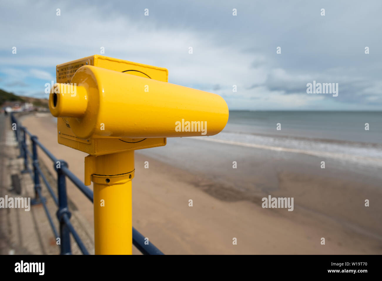Yellow Seaside Telescope Filey north Yorkshire Coast Stock Photo