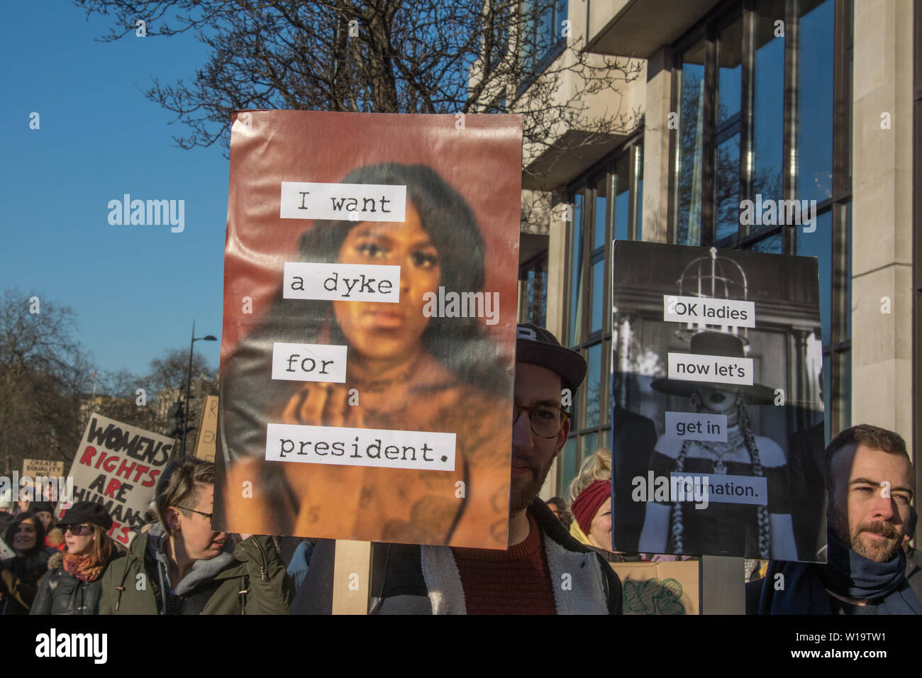 Women's March, London, UK, 21st January 2017. Protestors carry placards bearing a quote from a poem by New York artist Zoe Leonard 'I want ' during the Women's march in London the day after the inauguration of President Donald Trump. The quote is superimposed over an image of Mykki Blanco, a rapper who has performed the poem. The line in full is 'I want a Dyke for President'. Up to 10,000 took part in London as women worldwide marked the day by marching in an act of international solidarity. Stock Photo