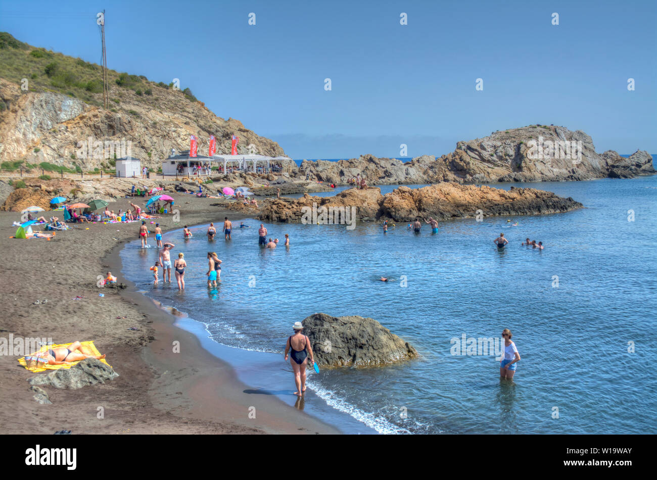 HDR image of the Black sand beach at Portman in Murcia, Spain Stock Photo