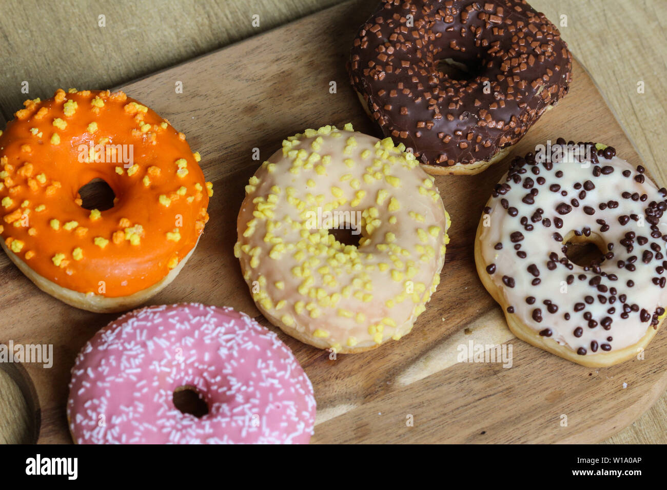 close up of different flavors of donuts Stock Photo - Alamy