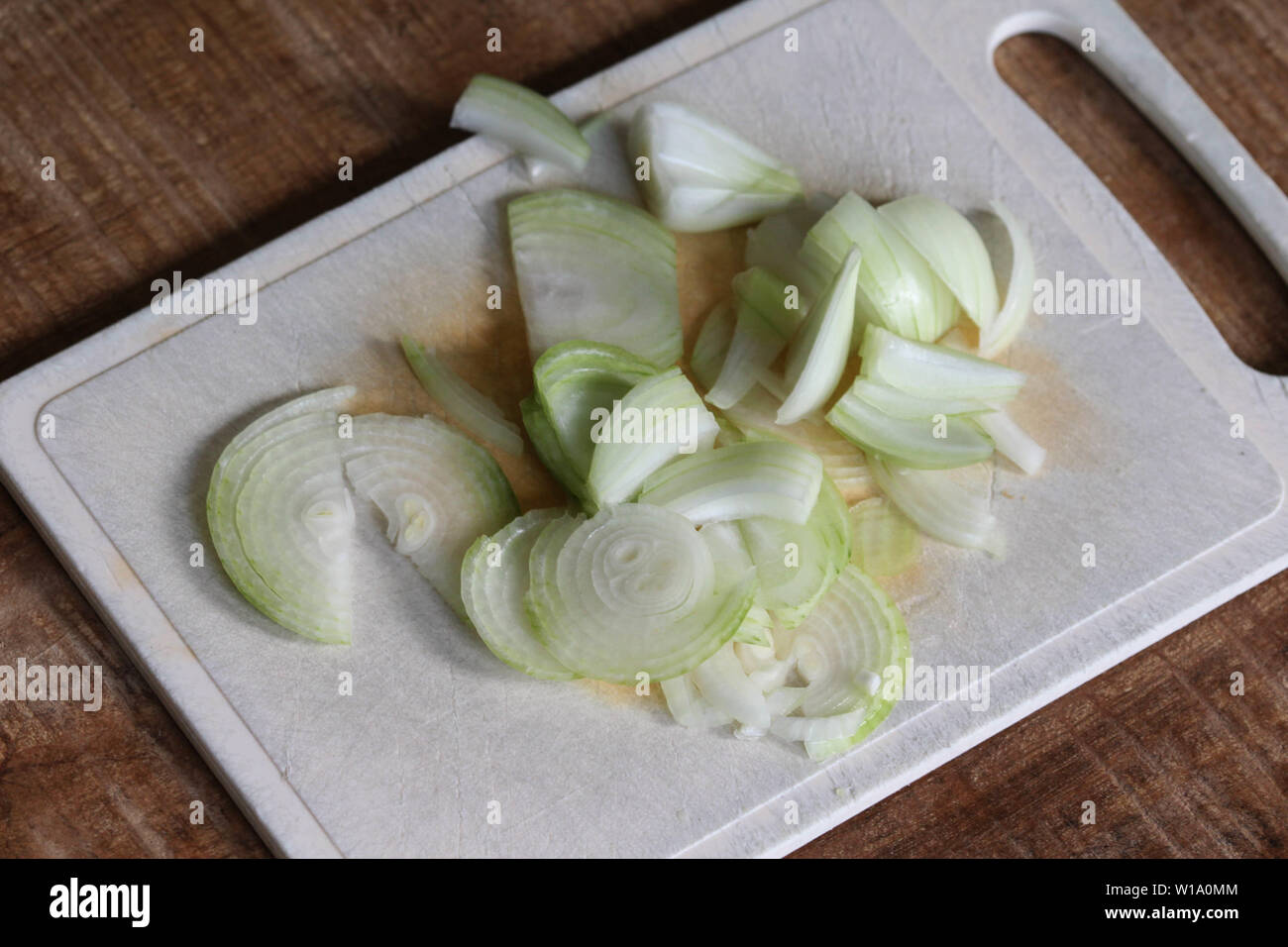 Woman chopping red onion close hi-res stock photography and images - Alamy