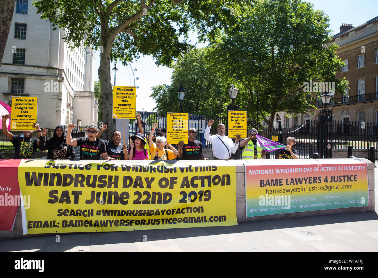 London, UK. 22 June, 2019. Campaigners from BAME Lawyers for Justice, comprised of Black Activists Rising Against Cuts (BARAC UK) and an umbrella of o Stock Photo