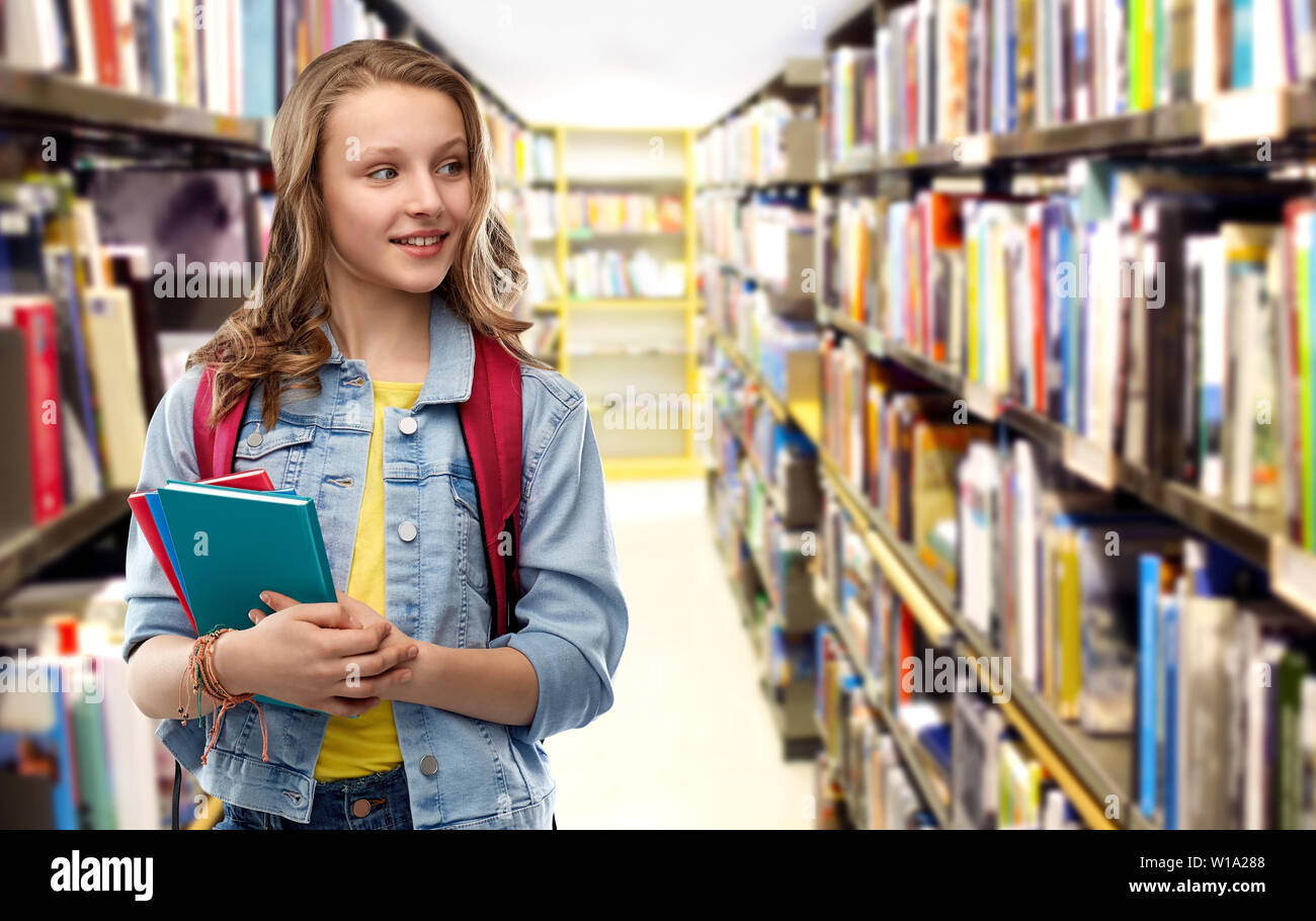 happy smiling teenage student girl with school bag Stock Photo - Alamy