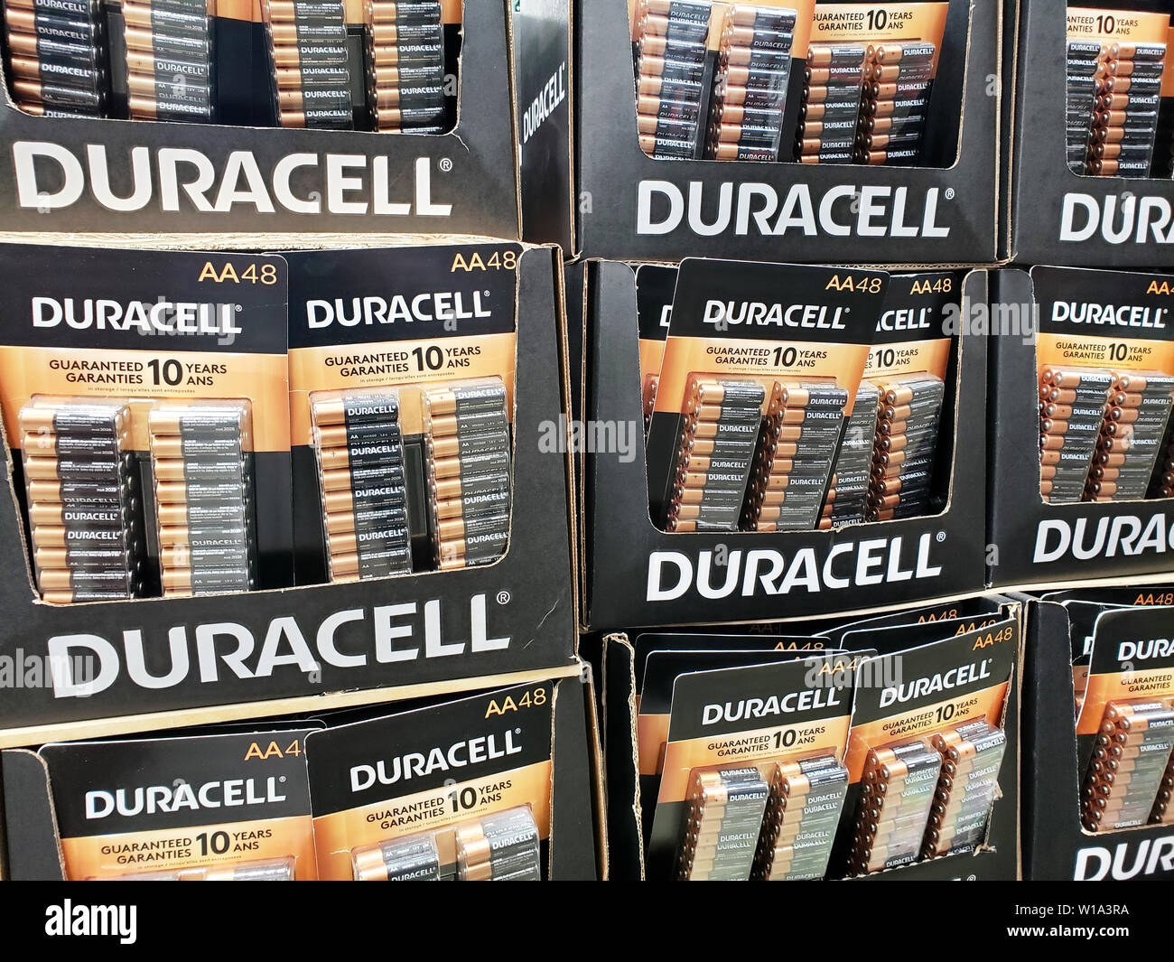 MONTREAL, CANADA - JUNE 20, 2019: Duracell packages stand in Costco warehouse. Duracell is american manufacturing company owned by Berkshire Hathaway Stock Photo