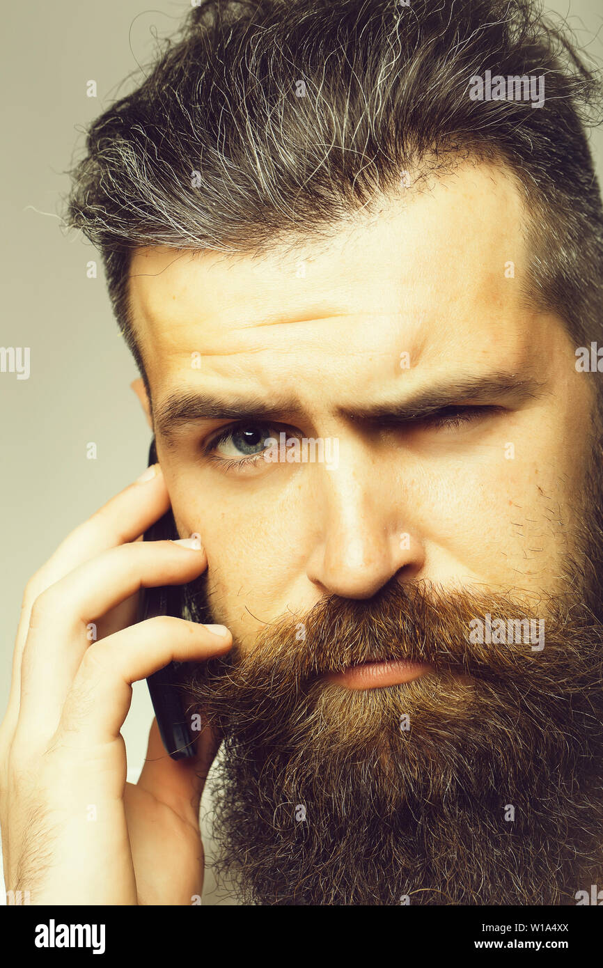 Serious bearded man speaking hi-res stock photography and images - Alamy