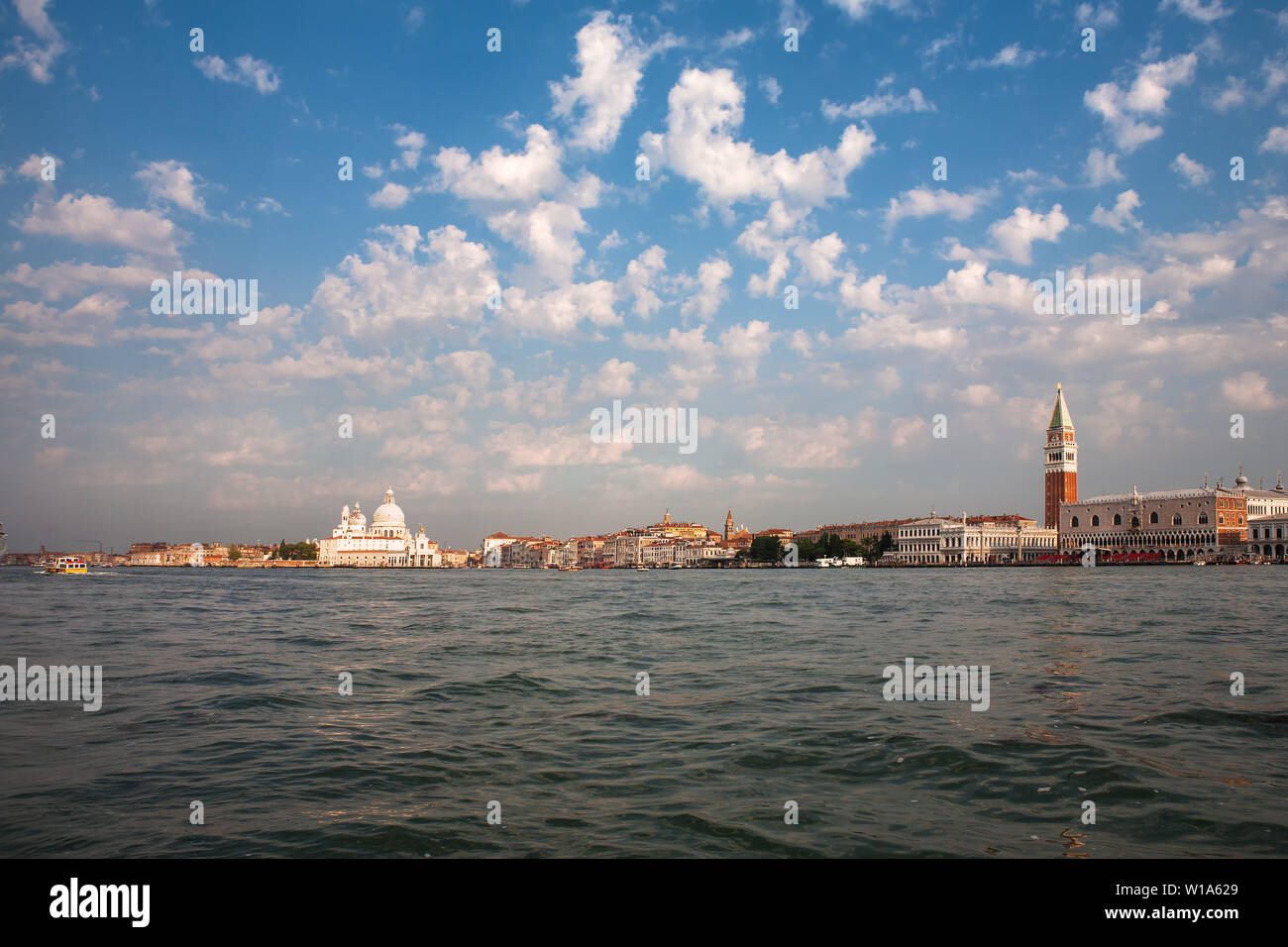 Arrival in Venice by sea: San Marco, Punta della Dogana, Canale Grande, Campanile di San Marco, and the Palazzo Ducale, Venice, Italy Stock Photo