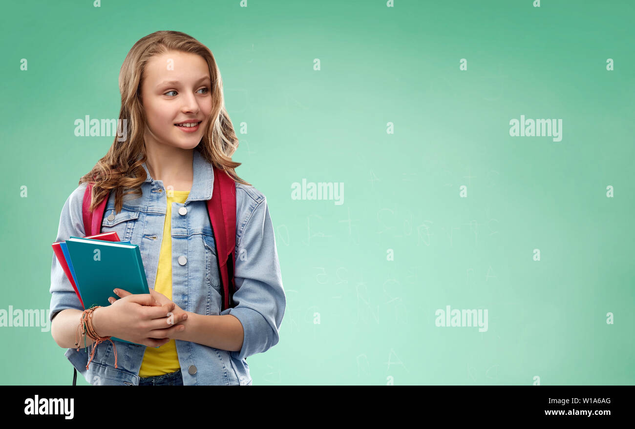 happy smiling teenage student girl with school bag Stock Photo - Alamy