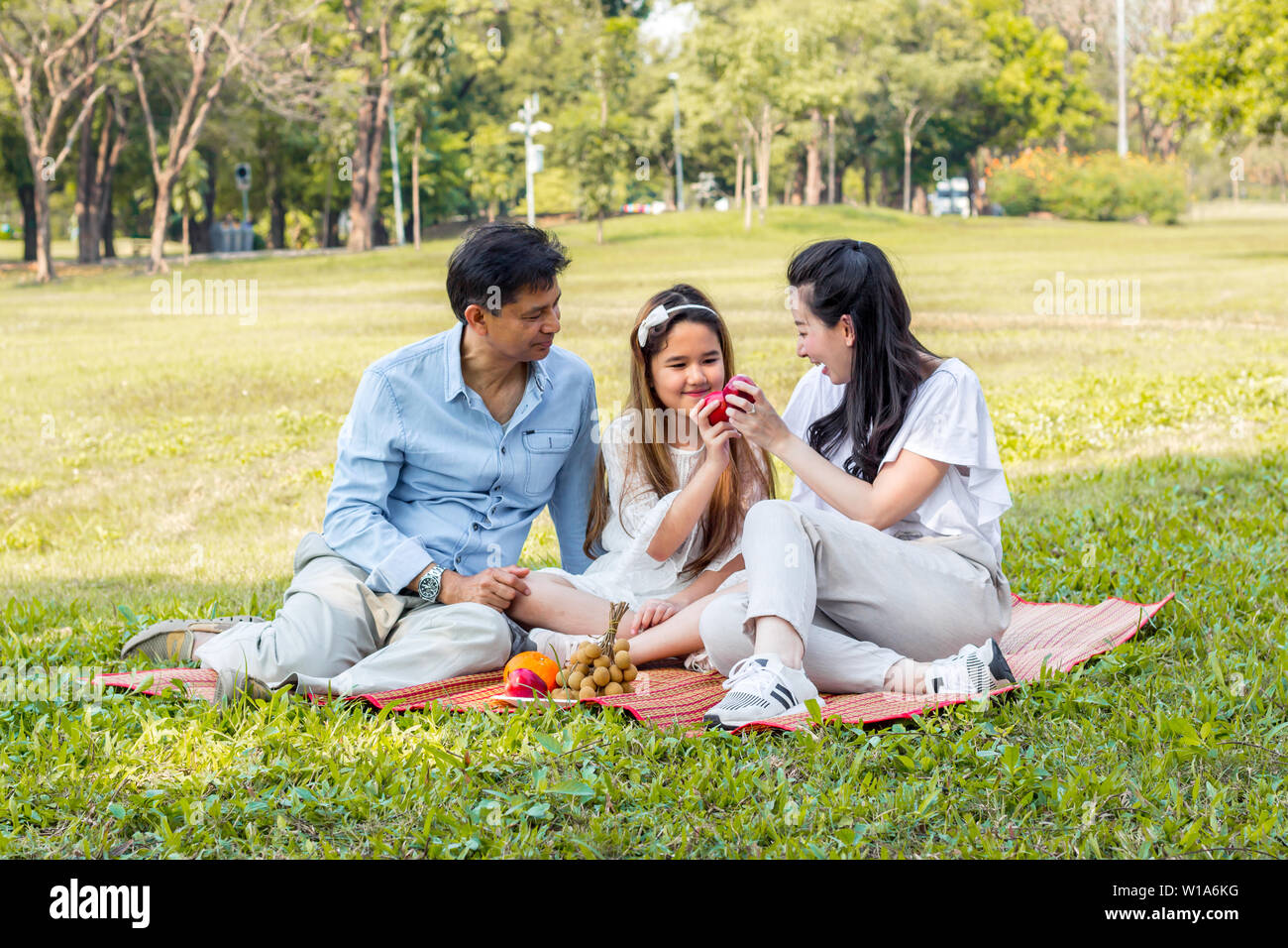 Asian family picnic fruit hi-res stock photography and images - Alamy