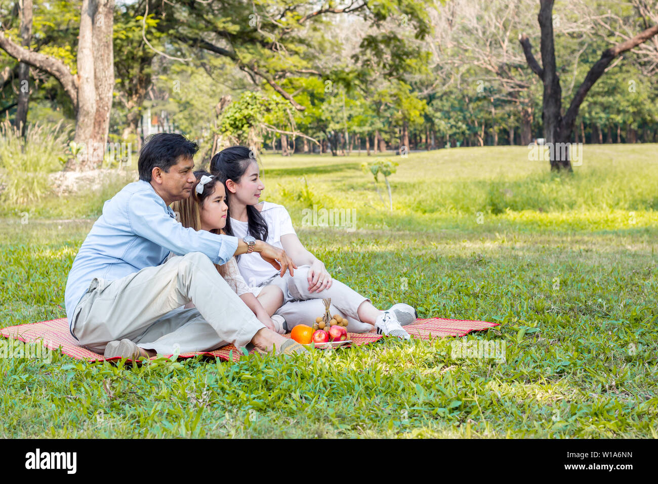 Asian family picnic fruit hi-res stock photography and images - Alamy
