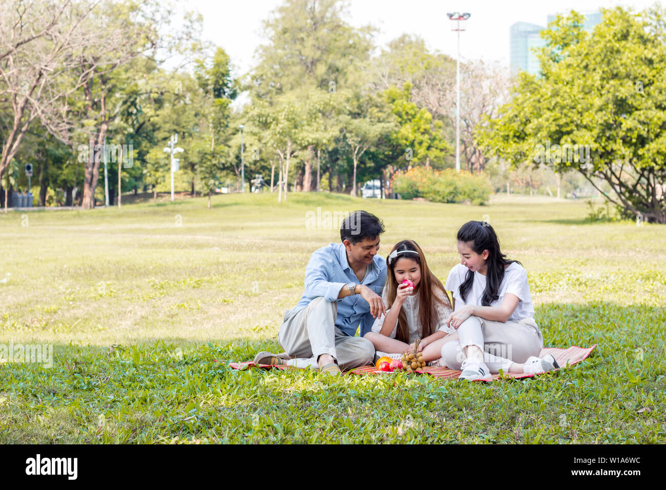 Asian family picnic fruit hi-res stock photography and images - Alamy
