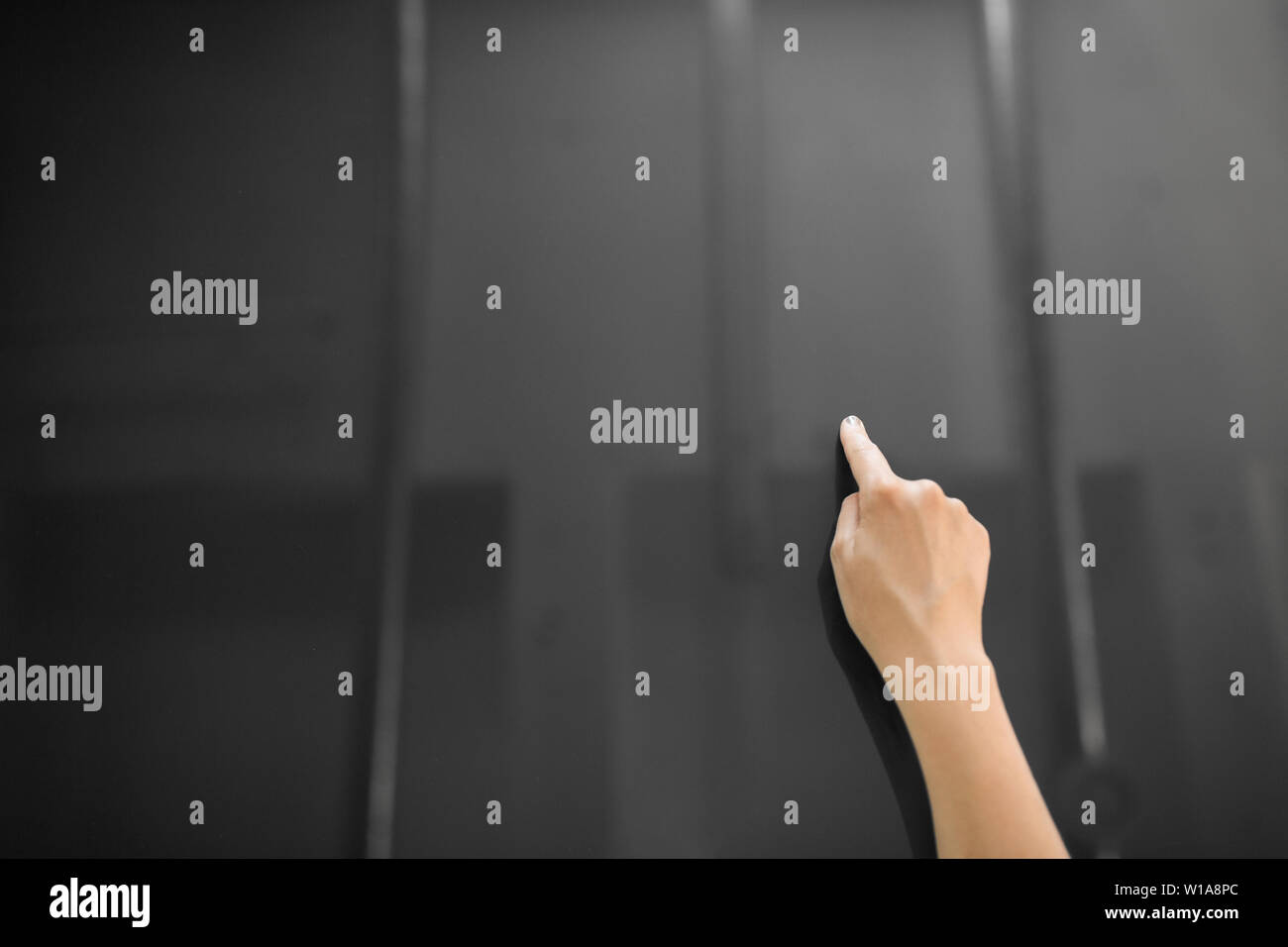 hand using black interactive panel Stock Photo