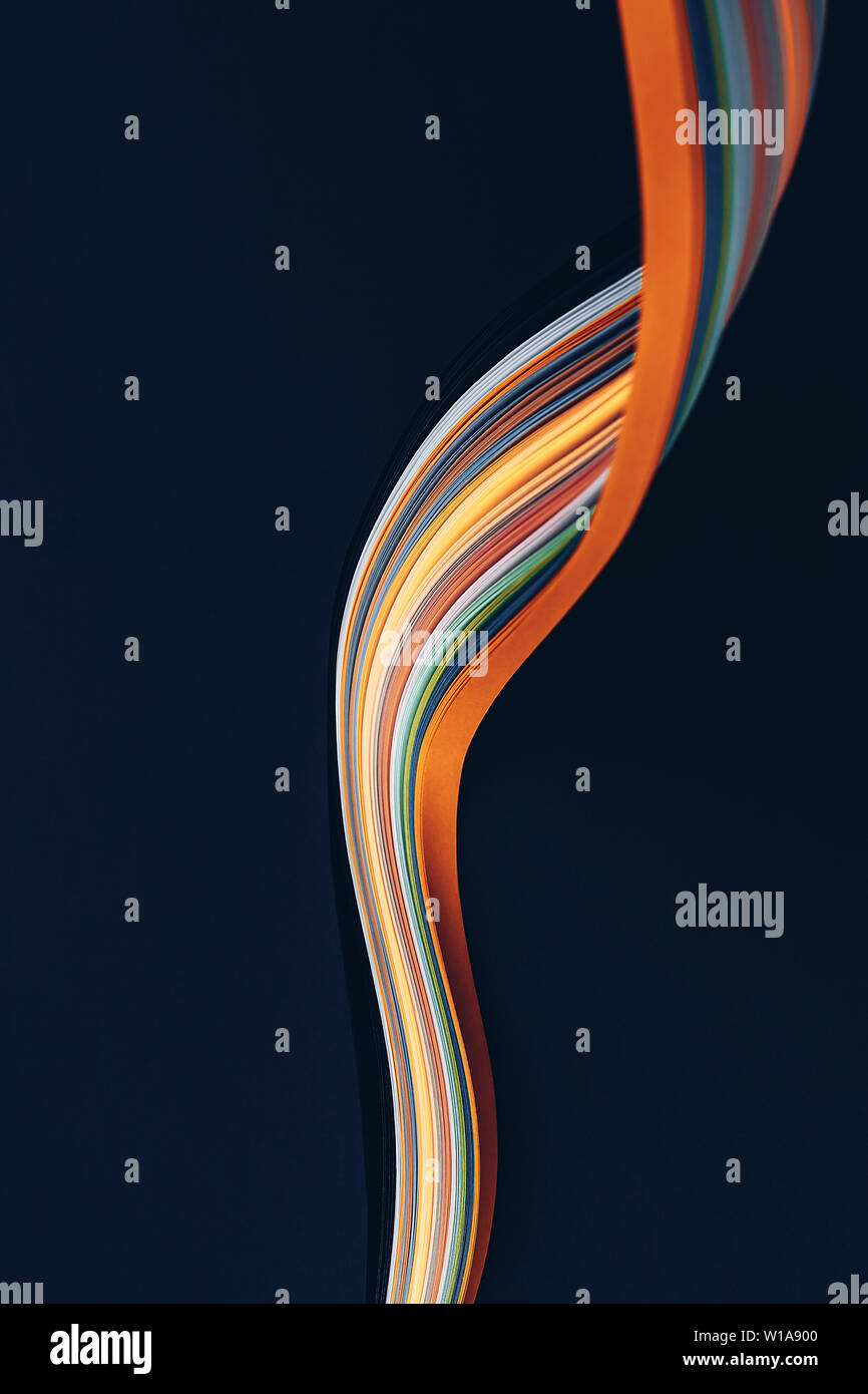 Macro photo of abstract bright wavy lines on black background. Abstract ...