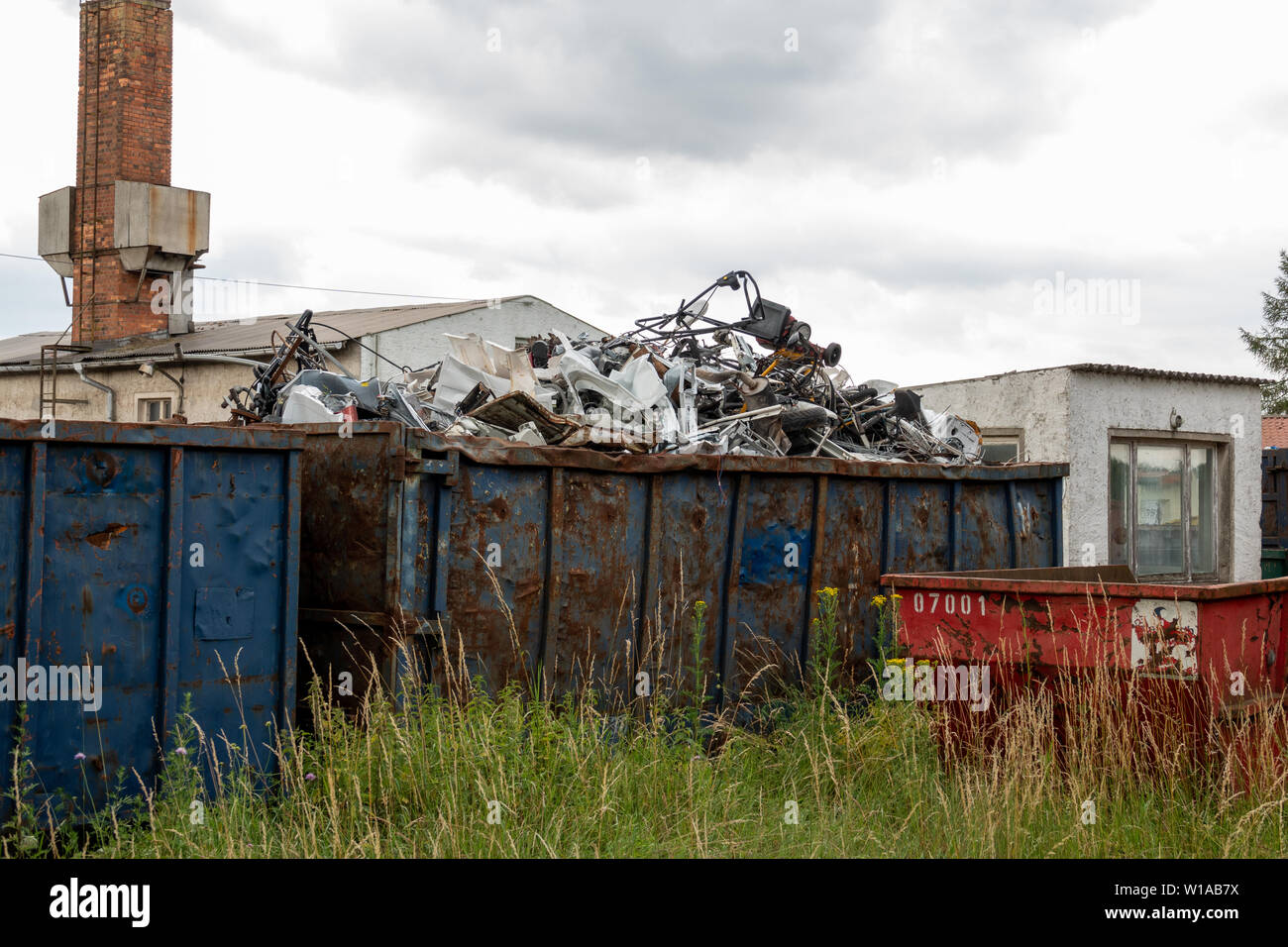 Metal scrap is located in large containers Stock Photo - Alamy