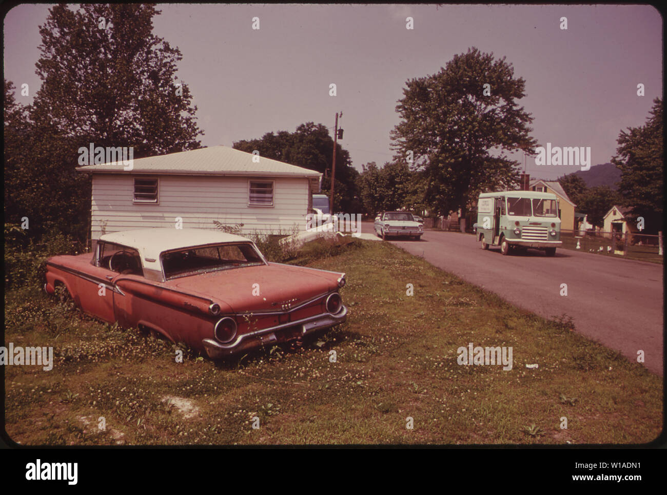 A JUNKED AUTOMOBILE ON A VACANT LOT IN RAND Stock Photo Alamy
