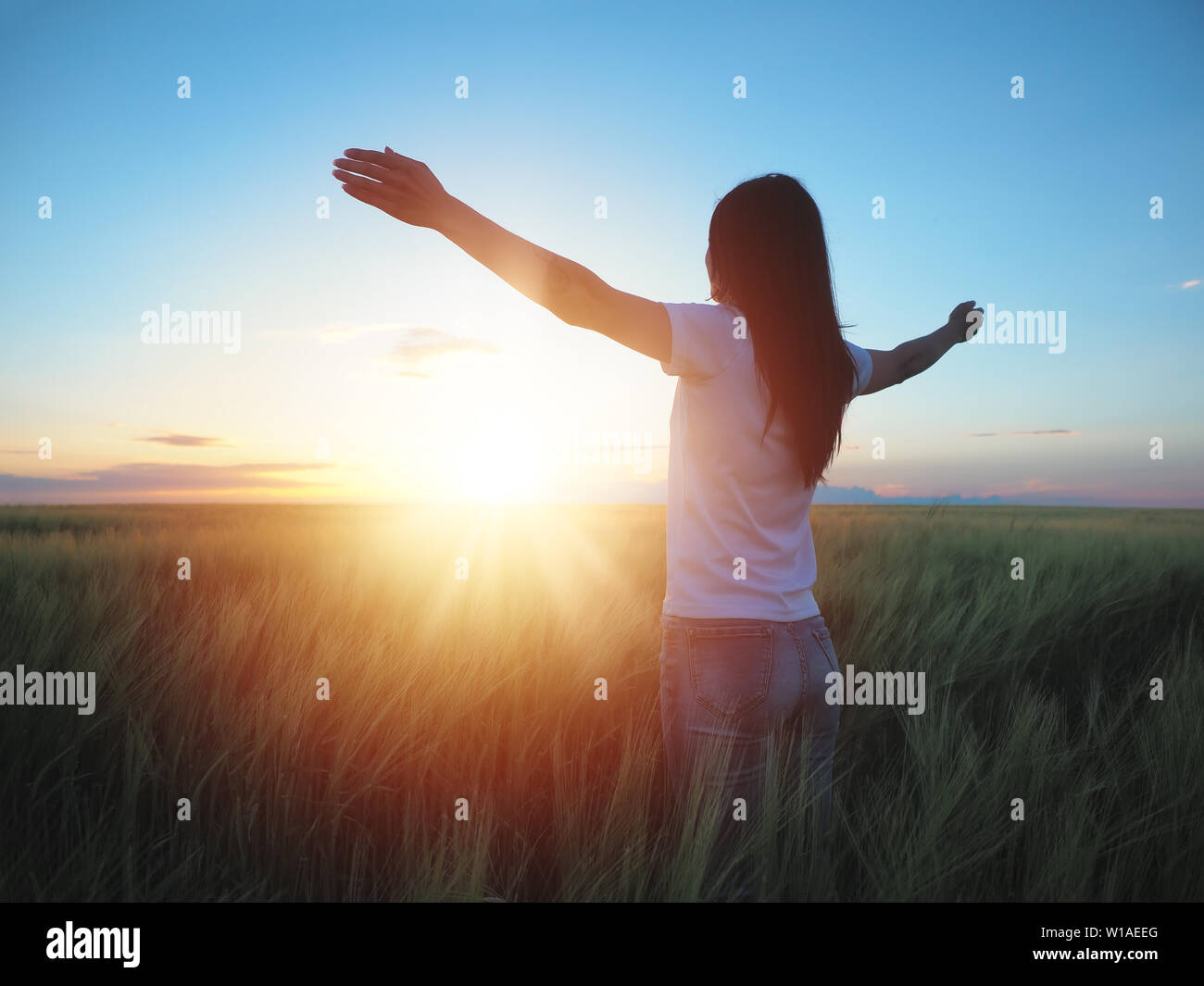 women praising god in white