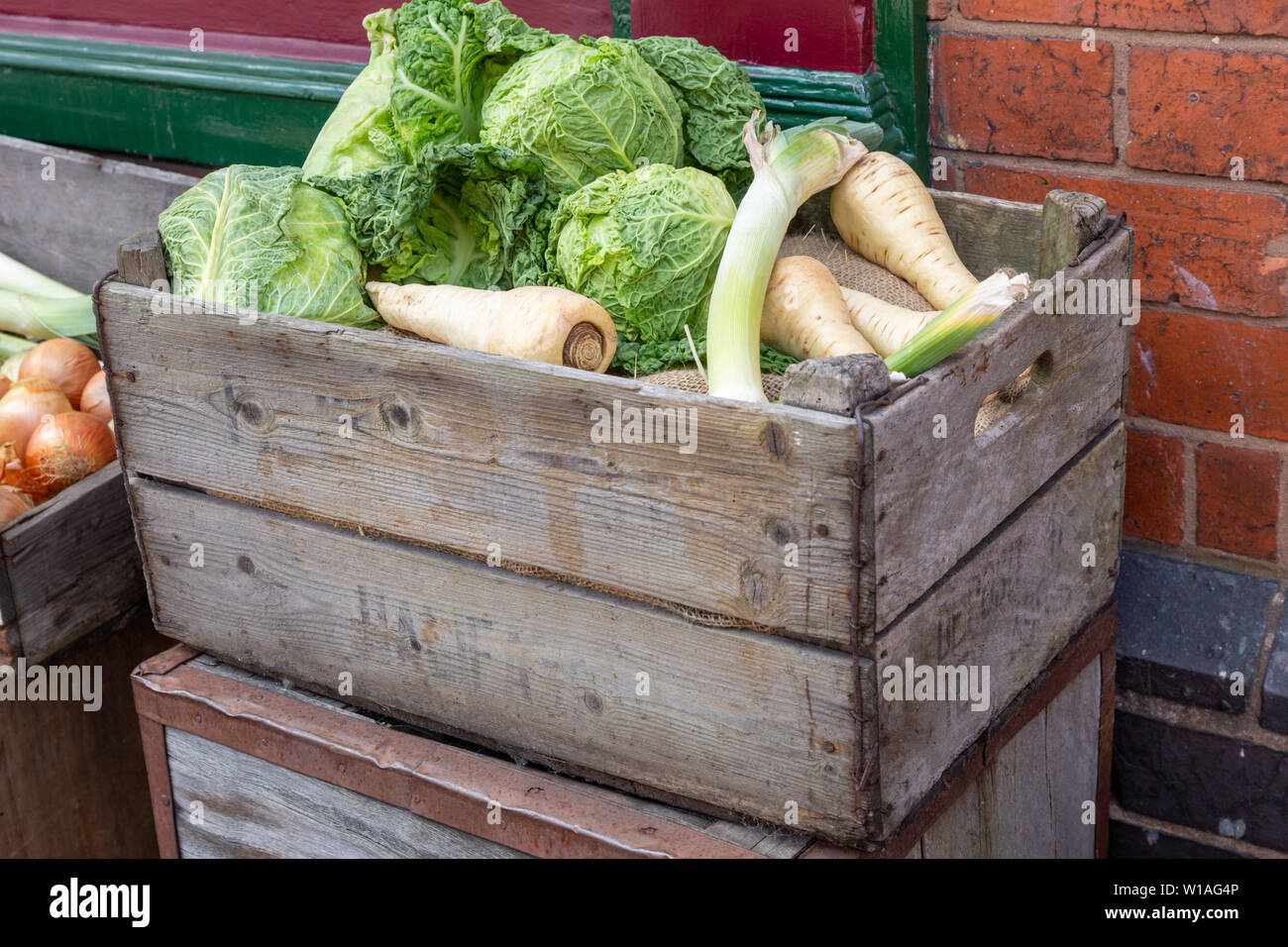 Wooden box of fresh vegetables - using no packaging or plastic Stock Photo