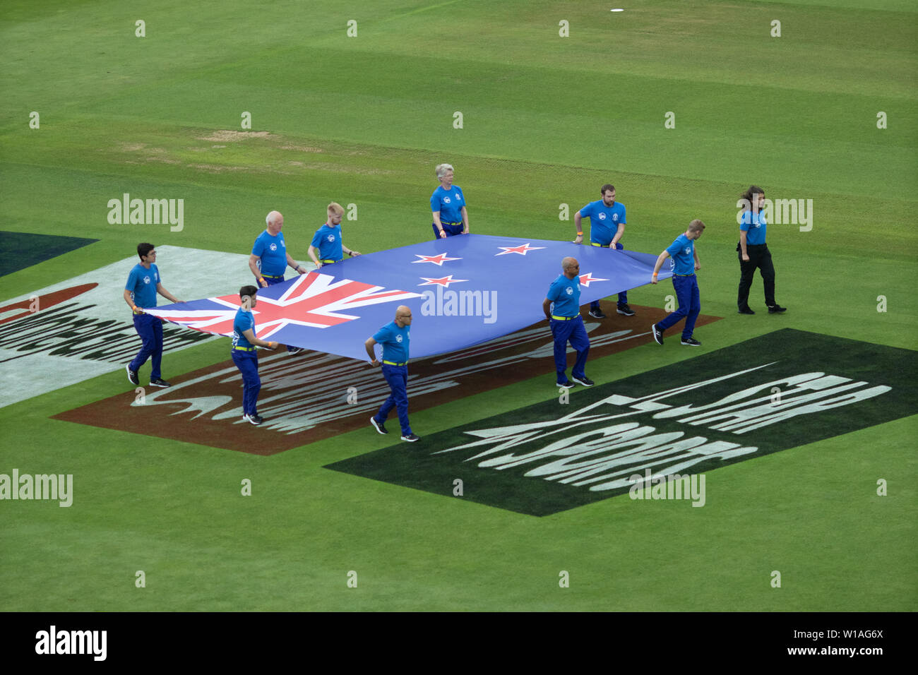 28th June 2019 - Flag bearers parading the New Zealand Flag prior to the game against Pakistan in the 2019 ICC World Cup held in England and Wales Stock Photo