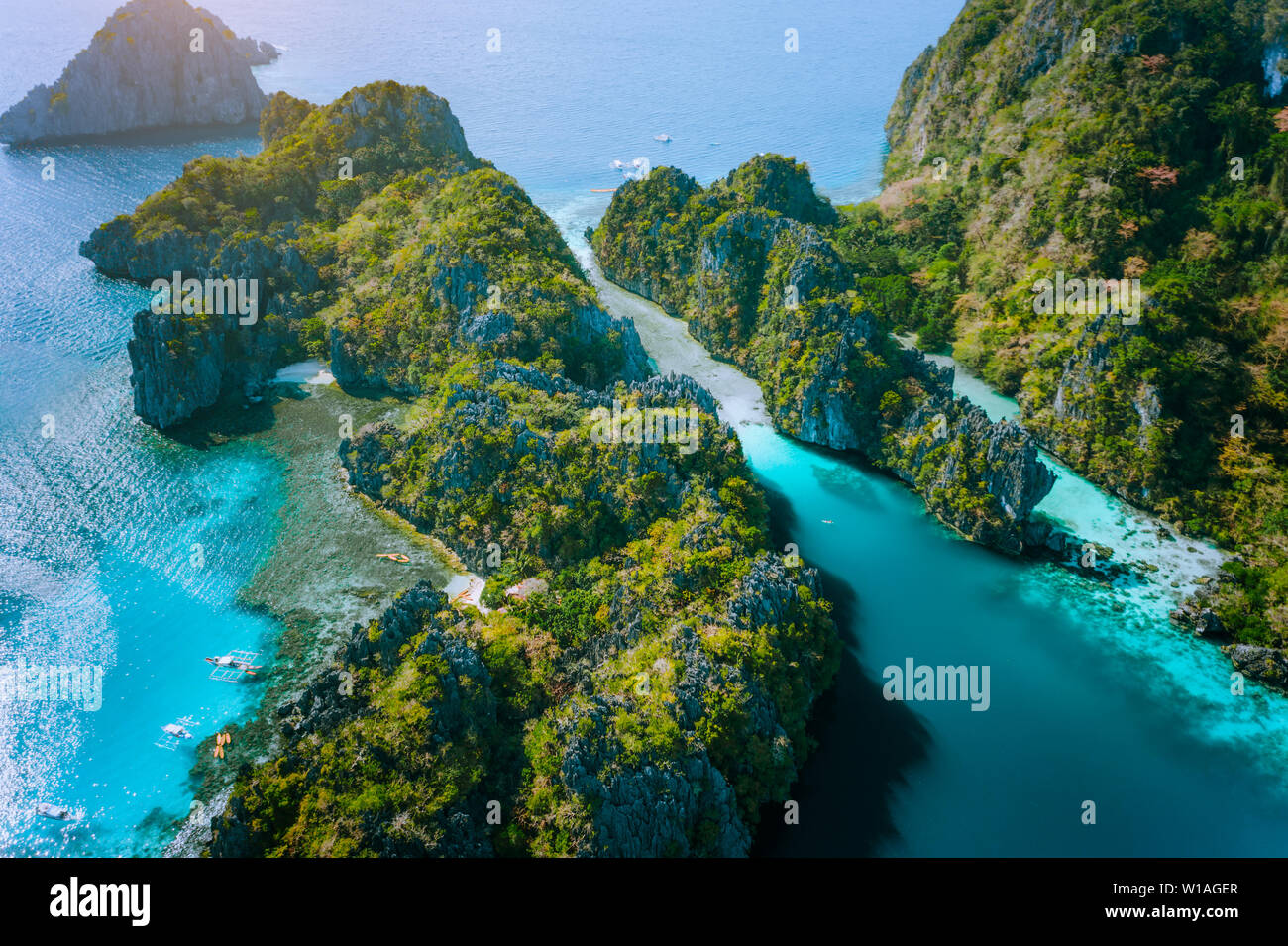 Aerial drone view of Big lagoon and majestic rocks. Discover explore El Nido, Palawan Philippines. stunning attraction, tour trip, island hopping. Stock Photo