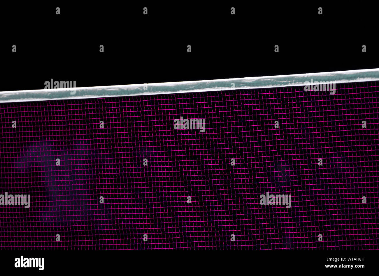 Badminton net indoor on badminton court, closeup view of badminton net