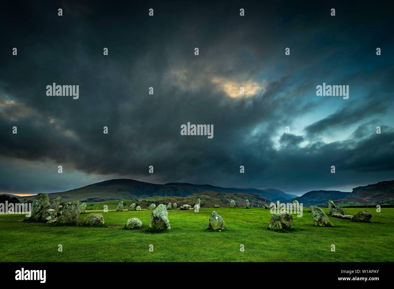 Stone circle with dramatic dark cloud sky, Keswick, Yorkshire Dales National Park, Central England, Great Britain Stock Photo